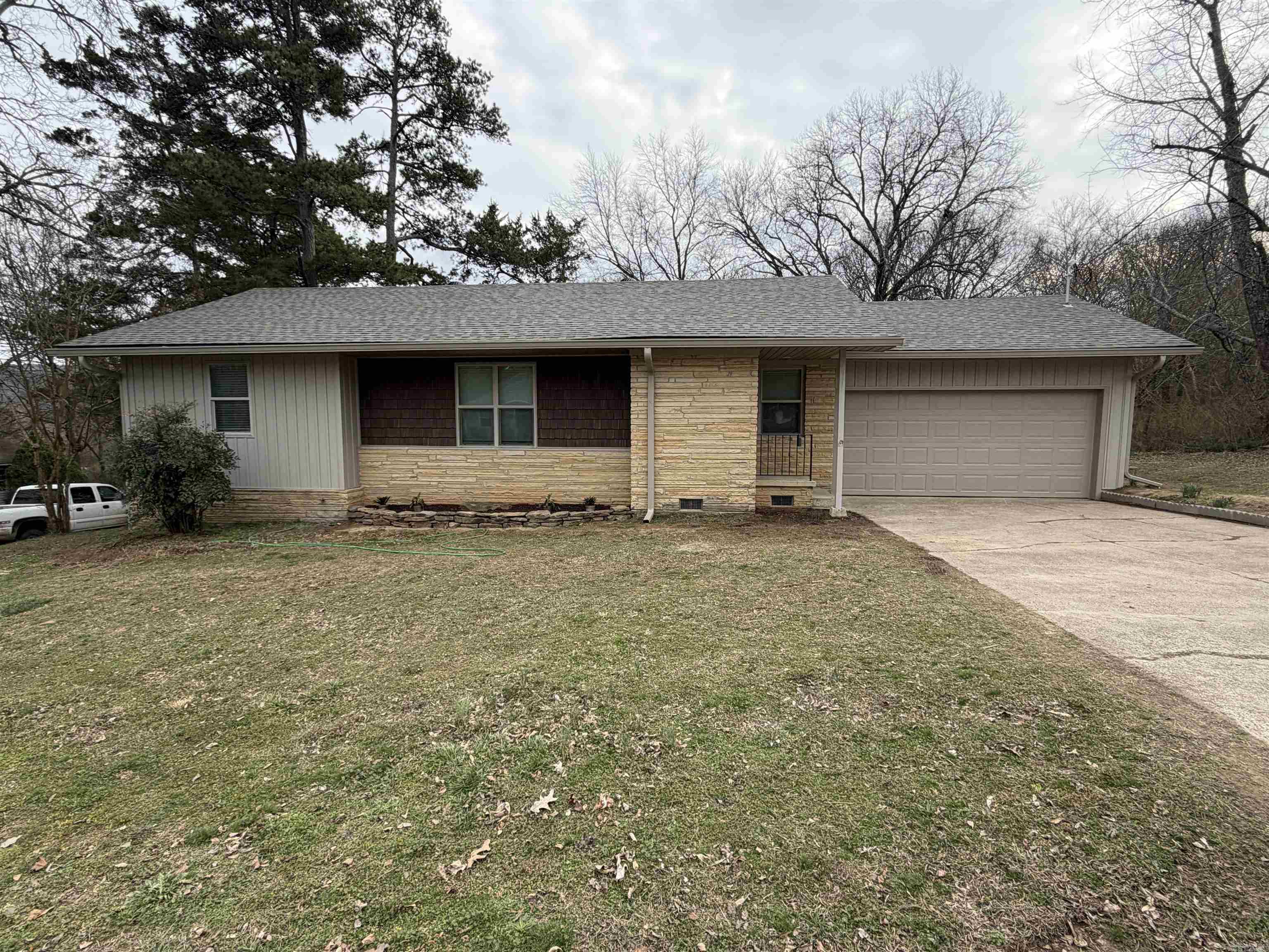 Step into this beautifully remodeled home, upgraded from the foundation up with modern systems and stylish finishes. A brand-new roof and new HVAC system provide long-term peace of mind, while the new exterior siding and new deck elevate curb appeal and outdoor living.  Inside, the home feels bright and clean. Hardwood floors flow throughout the main living areas, complemented by fresh interior paint in a warm, neutral palette. The kitchen has been fully refreshed with new cabinets, countertops, new appliances, and updated fixtures—perfect for everyday cooking or entertaining.  Behind the walls, the home has been thoughtfully modernized with updated plumbing and new electrical, offering improved efficiency, safety, and reliability. Every detail has been addressed to create a truly move-in-ready home that blends modern comfort with timeless charm.  This complete renovation delivers the rare combination of style, function, and peace of mind
