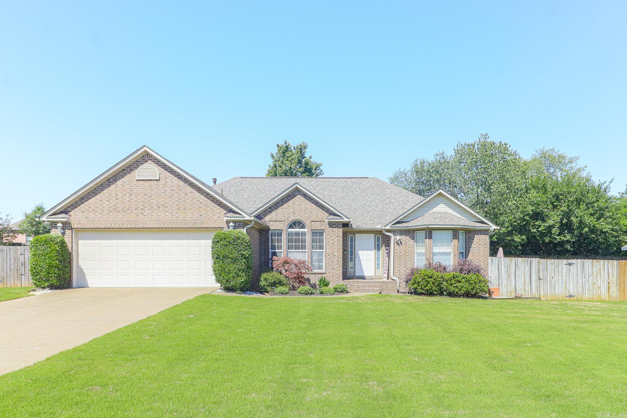 Welcome to this well-maintained 3-bedroom, 2-bath home in Ridge Run Subdivision offering 1,788 sq ft of comfortable, functional living designed for everyday ease. The split floor plan provides ideal separation for privacy, while the inviting living room features a fireplace currently set up for wood-burning use with the option to convert to gas. A newer roof (2024) adds valuable peace of mind, reducing future maintenance concerns. Outside, enjoy a fully fenced wood privacy backyard perfect for pets, play, or quiet evenings, along with a private hot tub that creates a relaxing retreat right at home. Conveniently located just minutes from NEA Baptist Memorial Hospital, this home is ideal for healthcare professionals or anyone wanting quick access to major medical services. Everyday convenience is unmatched with nearby grocery options and popular dining in the Hilltop area, keeping errands and meals out simple and efficient. A move-in-ready opportunity combining comfort, updates, and a highly practical location.