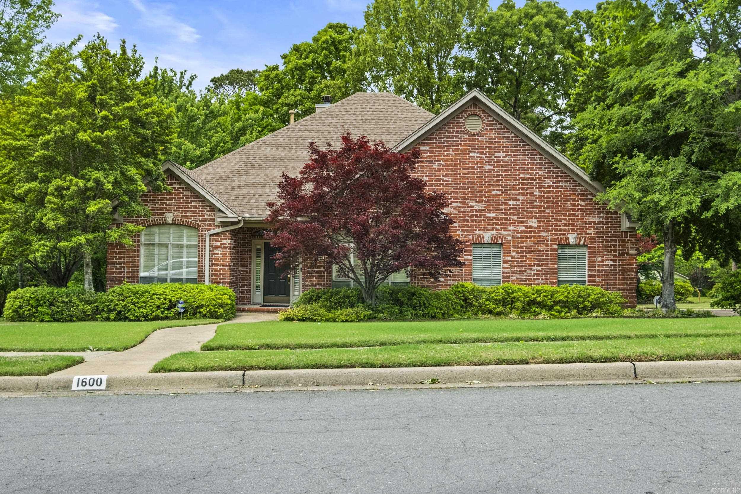 Situated on a spacious corner lot, this stately one level home is designed for gracious living.  The oversized rooms are flooded with natural light while being adjusted with custom plantation shutters. The formal dining room is perfect for entertaining while the large living room easily accommodates family and guests. The split bedroom plan is perfect for family living or offering privacy for guests.  The Keeping Room overlooks a large private deck.  The updated kitchen includes beautiful stone countertops, electric range (gas piped option) and large prep space. Additional features are the 3 or 4 bedrooms, with the 4th bedroom as an optional office space, 2 full bathrooms and a half/guest bath, The Laundry room with extra storage, is perfectly positioned by the primary bedroom and kitchen.  The curb appeal is enhanced by the side loading garage and beautiful landscaping with sprinkler system.  Don't miss this one level home located in the beautiful Pebble Beach Woods subdivision of west Little Rock.  Sq ft is from courthouse and is not to be relied upon.  Please feel free to measure.