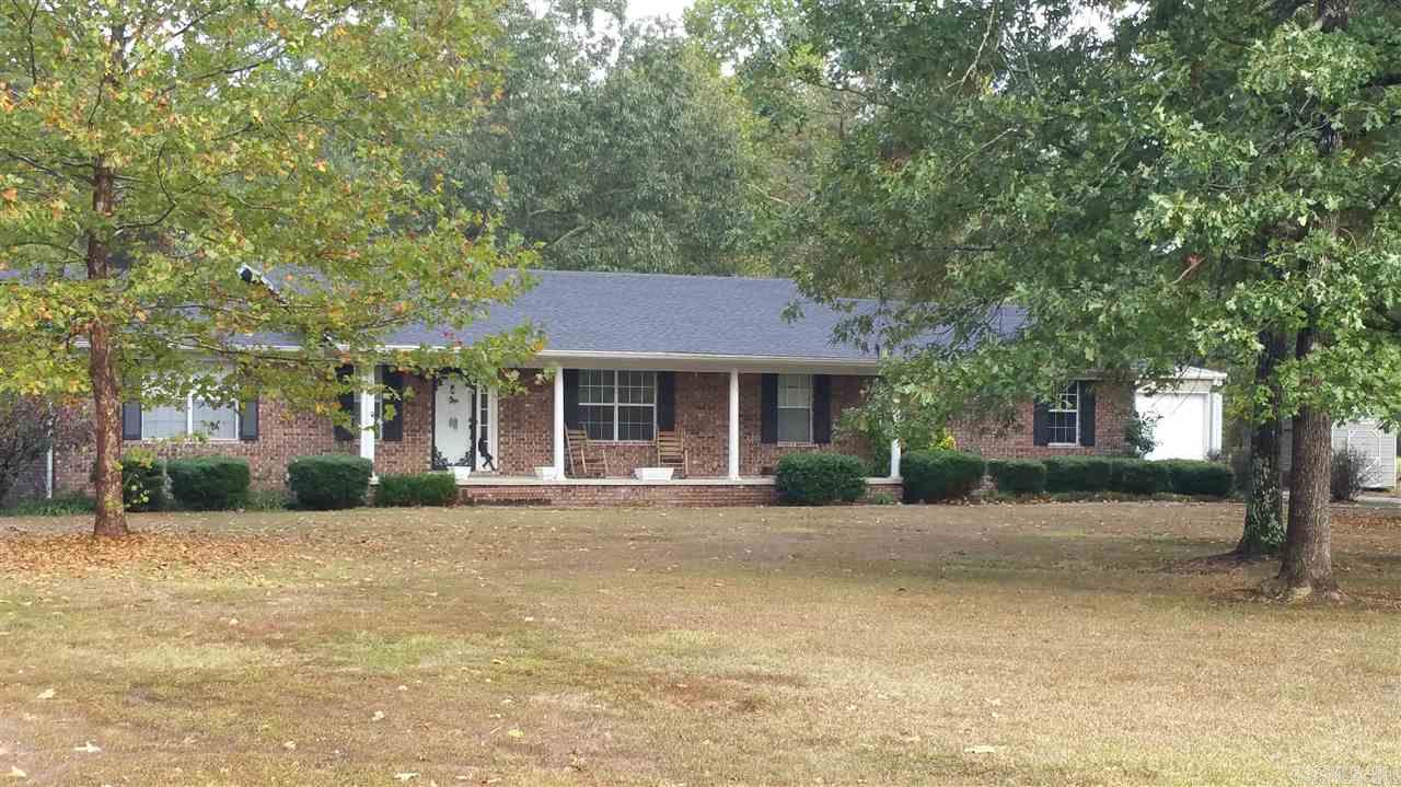Great established family subdivision only 15 mins from downtown Little Rock.  Home features 3 spacious bedrooms, 2 living areas, beautiful corner brick wood burning fireplace in den for those cold winter nights ahead, and a wonderful bright sunroom all on 3 wooded acres. New 30x30 metal shop with 2 overhead doors. New roof, new hot water heater, new paint and flooring in den. Lots of square footage for a growing family, don't miss this wonderful brick county home