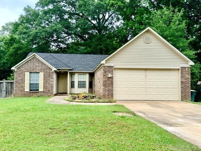 Desirable Tall Timber West subdivision of Little Rock — where comfort, convenience, and functionality come together. This 3-bedroom, 2-bath home offers an inviting split-bedroom floor plan designed for both privacy and everyday living.  Step inside to a warm and welcoming great room featuring comfortable gathering space perfect for entertaining or relaxing evenings at home. The eat-in kitchen provides ample room for casual dining, morning coffee, and welcoming conversations while offering practical flow for daily living.  The spacious primary suite is thoughtfully separated from the additional bedrooms, creating a private retreat within the home. Outside, enjoy a fully fenced backyard complete with a deck ideal for grilling, outdoor entertaining, or simply unwinding after a long day. A 2-car garage adds convenience and additional storage space.  Located in the easily accessible Tall Timber West neighborhood, this property offers quick access to shopping, dining, schools, and major thoroughfares throughout Little Rock.  Move-in ready and available for immediate viewing — this home is prepared to welcome its next owner. Schedule your private tour today. *FLOOD INSURANCE IS REQUIRED.