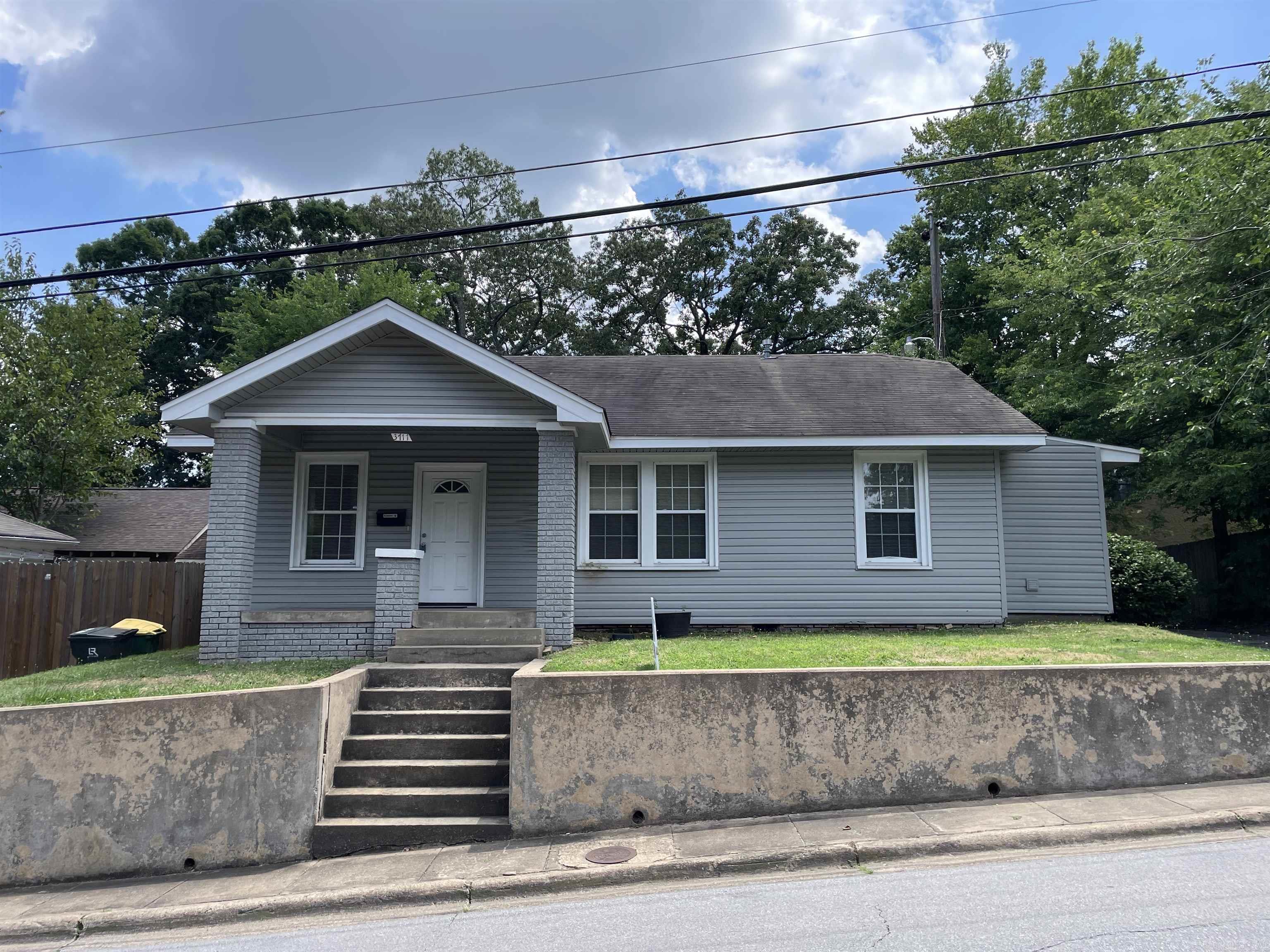 Walking distance to UAMS. Located in a quiet neighborhood. This beautiful home is the perfect home. It has hardwood floors throughout with a detached garage. It also has a gated backyard with tons of privacy.