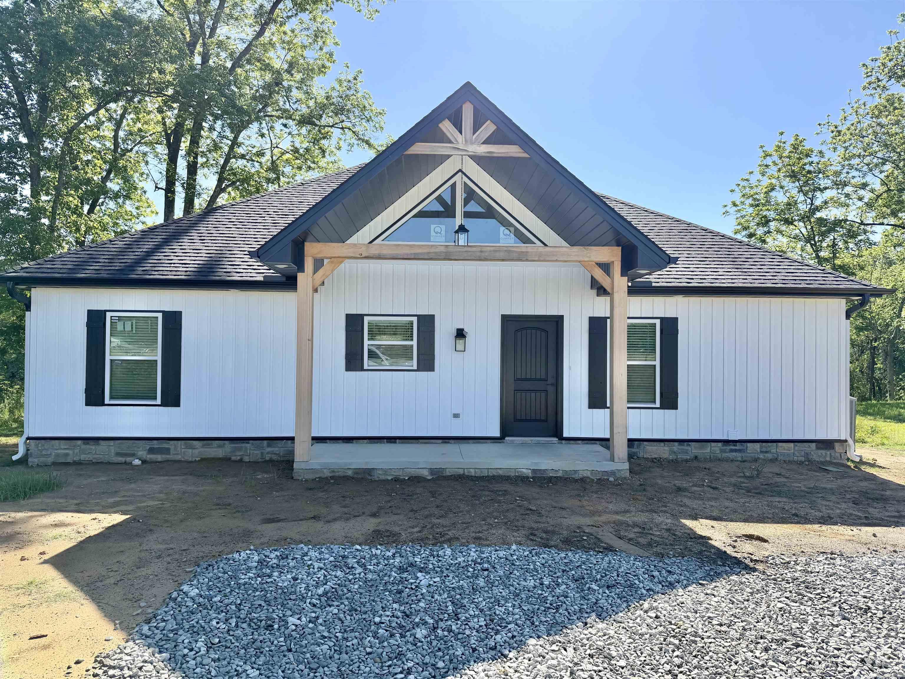 (Seller is also offering $10,000 allowance for buyer to have paved parking area) New construction on the Little Red River with a private boat dock!  The home features a desirable split floor plan designed for comfort and privacy. Enjoy river views from the spacious living room and the primary suite, both offering French doors that open onto a large covered back porch overlooking the water and your private boat dock.  Inside, the home is designed with gatherings in mind. The spare bedrooms include built-in bunk beds, making it perfect for hosting family and large groups. Whether you're looking for a full-time residence, weekend getaway, or investment property, this riverfront home offers the perfect setting for relaxing and enjoying life on the water.