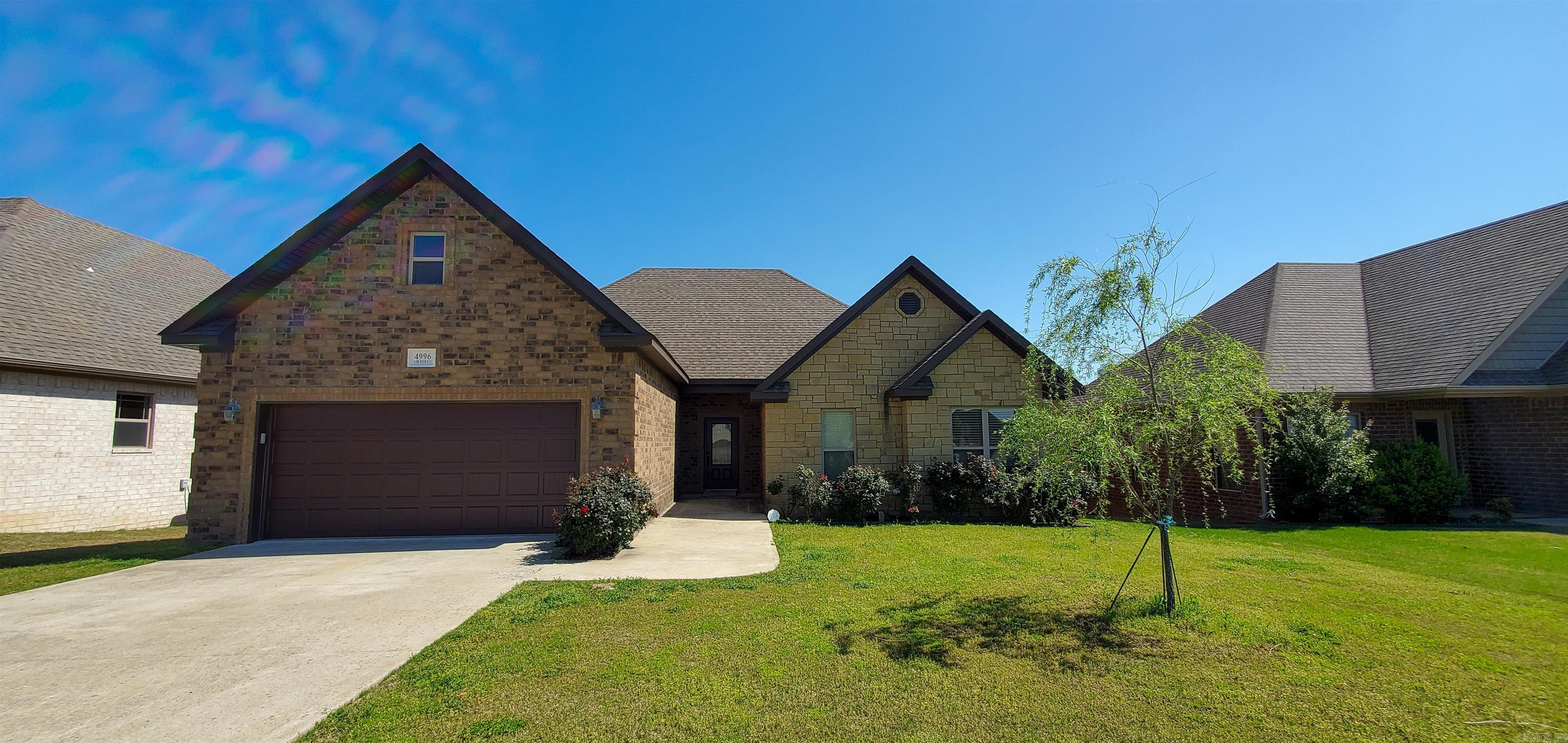 *Ready for Immediate Occupancy!* Application required including background, credit and eviction report ($38). No pet and No smoking policy.  Golf Course living with this beautiful 4 bedroom and 3 bath home located in Sage Meadows. The main level offers a large, open space with the living room and kitchen being separated by a large island. Stone fireplace in the living room and is great focal point. Kitchen is perfect for entertaining with a gas stove and lots of cabinet & countertop space plus a walk-in pantry. Primary suite with great view of the course, custom tile shower plus separate soaking tub. 2 other bedrooms (split bedroom plan) are good sized on main level with the 4th bedroom & full bath upstairs. Outdoor living is a must in this neighborhood and this home provides a screened porch and deck that overlook the course.
