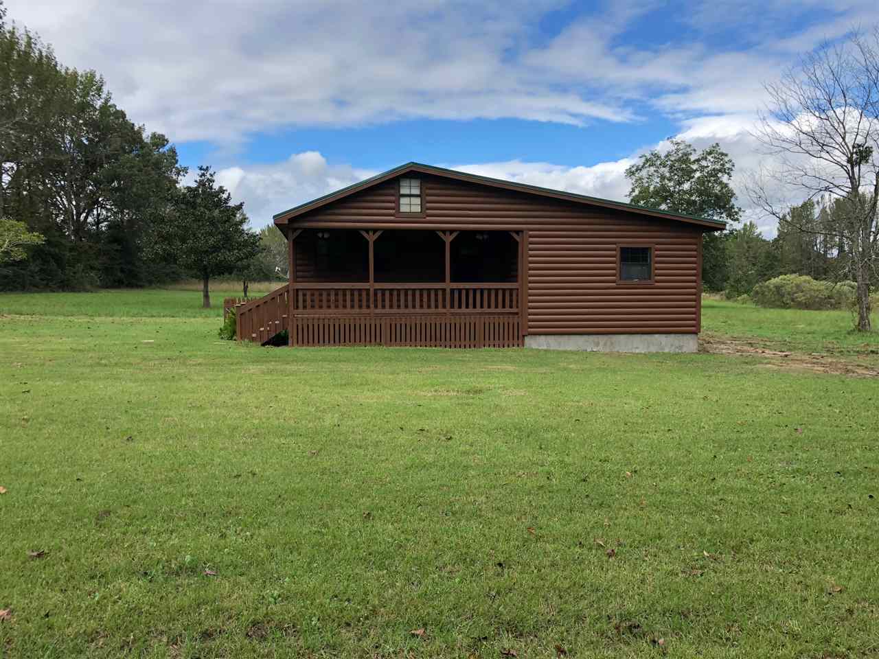 Country Living with Convenience is here in this home! On Carrington Road's approx 2-acres, this home offers a 2-bed, 1.5-bath, 1-loft, Cabin open concept for living room, kitchen, & dining space. New roof, paint, floors, trim, doors, fixtures, and more...Complete remodel. If you are seeking privacy but easy on/off 67/167 commuting access you need to see this home! Updated pics and professional cleaning taking place ASAP.
