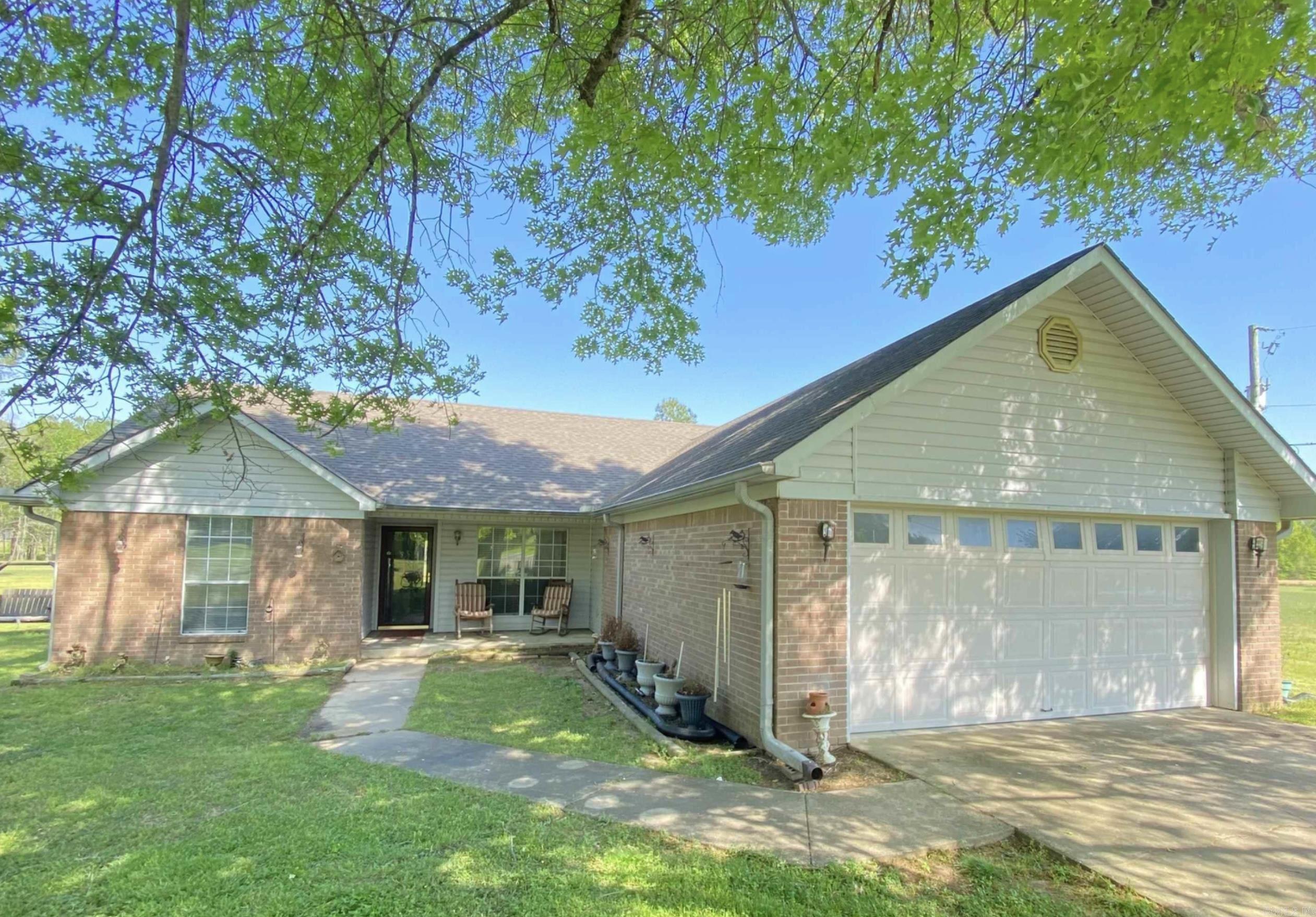 This charming 3 Br 2 Ba is nestled in a quiet, spacious neighborhood.  This home is sitting on 3.11 acres of level ground.  Lots of room for a garden, adding a pool, and just enjoying room to spread out.  The home itself is a split floor plan with an ample kitchen and eat in dining area. Off of the laundry room there is a bonus space that has been used as a beauty shop, but would make a great office area. If you are looking for an in town area with the feel of the country you will need to check this out soon.