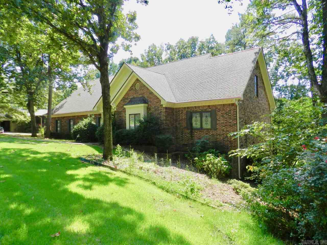 This one owner custom built home sits right on the lake! Large family room with built in's, fireplace, plantation shutters. Screened in porch!! Master bedroom down/bath with jetted tub, separate shower, his/her's closets.  Additional office/BR down. Upstairs incl two extra large bedrooms, jack-n-jill bath, walk in floored attic space designed to build out into a bonus room. New roof and all new HVAC systems were installed in 2018!