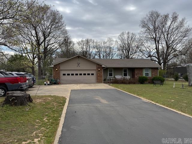 This 2016 square foot home has lots of important updates such as new 30 year architectural shingle roof in 2021, new TRANE HVAC in May 2025, new windows and custom blinds in 2020, new Bath Fitter walk in shower in November 2022 and new water heater in August of 2024. The 3 bedroom and 2 bathroom home has a master suite with private bath and walk in closet. There is a kitchen/dining combo, a laundry room/office and 3 separate living areas including a gorgeous sunroom! Other features include hardwood floors, current termite contract with Hyde’s, backup gas wall heater, 324 square foot covered deck off two of the living area, 528 square foot two car garage with two storage rooms and wheelchair ramp. Clay County Electric, Summit Gas, LCRW at the home and Clay County Fiber Optic Internet available. The 1.67 acres m/l are nice and level and have a chain link fenced area and a paved driveway. Just 3 miles to Pocahontas city limits. Close to hospital and Dr offices!