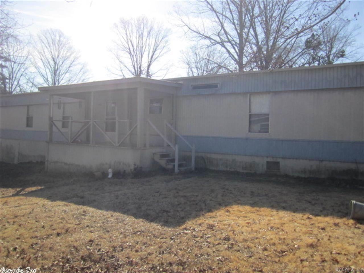 Cute mobile home in Alexander.  3 Bedrooms, 2 Bathrooms sitting on an acre.  Completely fenced.  Option to buy is possible