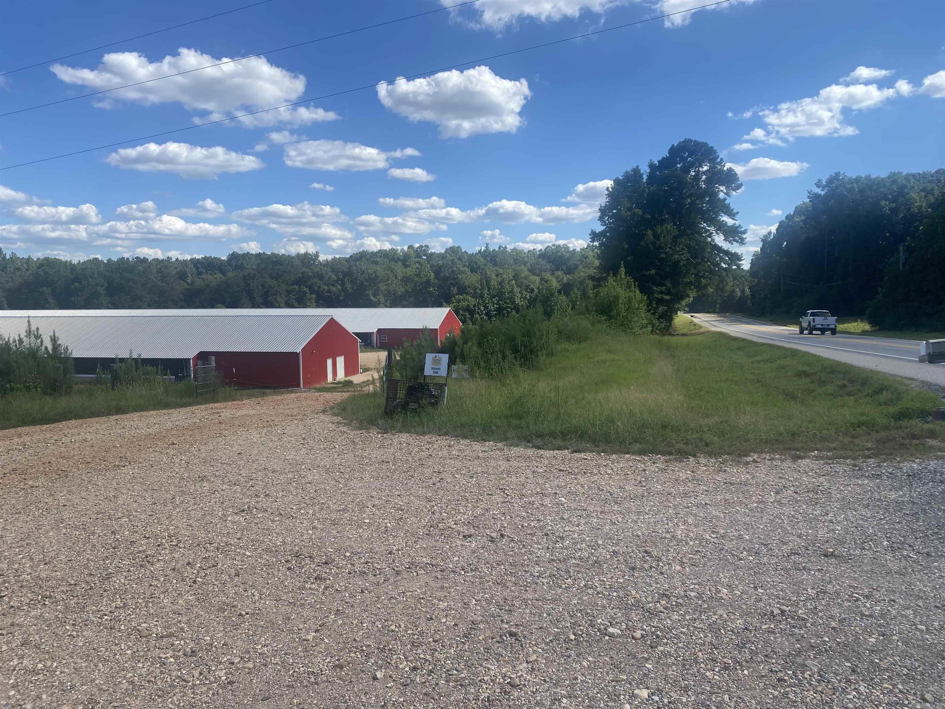 2018 Breeder Poultry Farm with two houses, located just north of Murfreesboro.  Property of 20 acres to be surveyed, contains a 2 bedroom, 2 bath mobile home with two breeder house, 40x640.  Equipped with the Prizen Vencomatic egg gathering system, automatic nest winching system, 100 KW John Deere Generator with 300 gallon fuel tank, and new incinerator. Rural water and well, highway frontage.  Contact our office for more details.