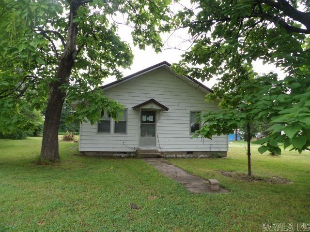 Clay County this corner lot single family residential property is offering 1.88 acres in the town of Rector. The interior has three bedrooms and one bathroom with an attached carport.