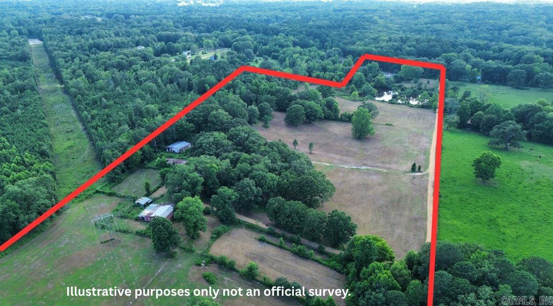 28.24 Acres of Beautiful Fenced Pasture Land – Ready for Your Dream Home or Farm! Discover the perfect blend of country living and convenience with this stunning 28.24-acre fenced property located at 2295 Sand Road, Malvern. This property offers endless possibilities. The land is mostly cleared and features several majestic mature oak trees that provide beauty, shade, and character, along with a scenic stocked pond that creates a peaceful setting. An established road runs across the property and includes a cattle guard and gated entrance, making access easy and convenient. The property is well-equipped with two large barns, a two-bay shop on a concrete slab, and an older barn and greenhouse that offer additional potential but will need a little TLC. An older mobile home is also included and will convey with the property at no value or Title. City water, sewer, electricity, and natural gas are already available on the property, making it an excellent location to begin building right away. Whether you're looking for the perfect place to build your dream home, start the farm this is it!