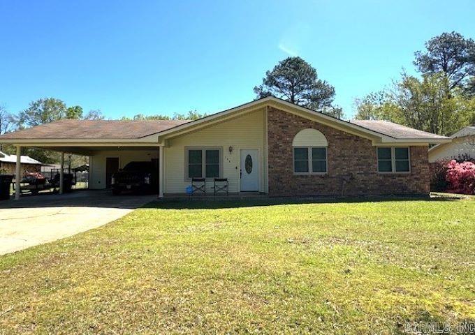 IMPROVED PRICE on this beautiful home located in Parkwood Subdivision and convenient to everything! Updated eat-in kitchen includes granite countertops, refrigerator, dishwasher, gas stove, a spacious island with storage, granite countertop and barstool space and tile flooring. The HVAC system was replaced 7/2022.  3 bedrooms, 1.5 baths on one side of this split floorplan, while a 4th bedroom and bath with walk-in closet were added on the other side. Current owners use this 4th bedroom as a den and accesses the covered patio in back with fenced yard and storage building. Solar panels purchased by the current owners to reduce the cost of electricity, call for more information about these. Roof age is unknown, but believed to be about 8-12 years old. Current security system will not convey with the sale of the home. Call today for your appointment!