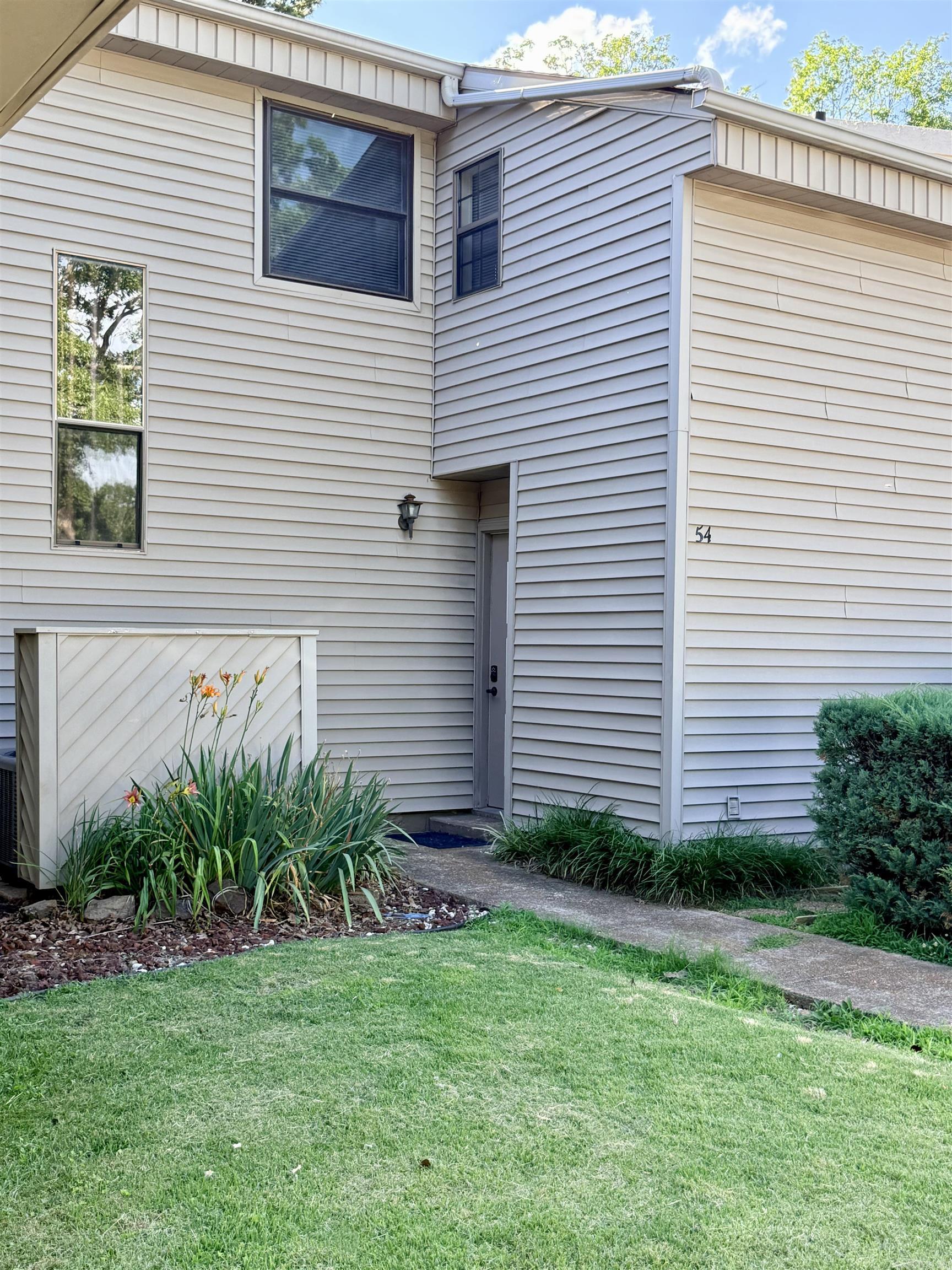 Move-in ready & a great value, this well-maintained Lakewood condo features brand-new carpet and fresh paint throughout. Located in a private setting backing up to a wooded area, this condo offers the perfect combination of comfort and convenience. Excellent full-time residence, vacation getaway, or investment property. Energy-efficient windows help keep utility costs low, while tile flooring in key areas adds durability and style. An additional sleeping nook adjoining one bedroom provides flexible space for guests or a home office. Ideally situated directly across from the private Lakewood pool and within walking distance of shopping, dining, entertainment, and the Hart Center, this condo offers an exceptional location and value. Don't miss this opportunity to own a condo in the heart of Fairfield Bay.