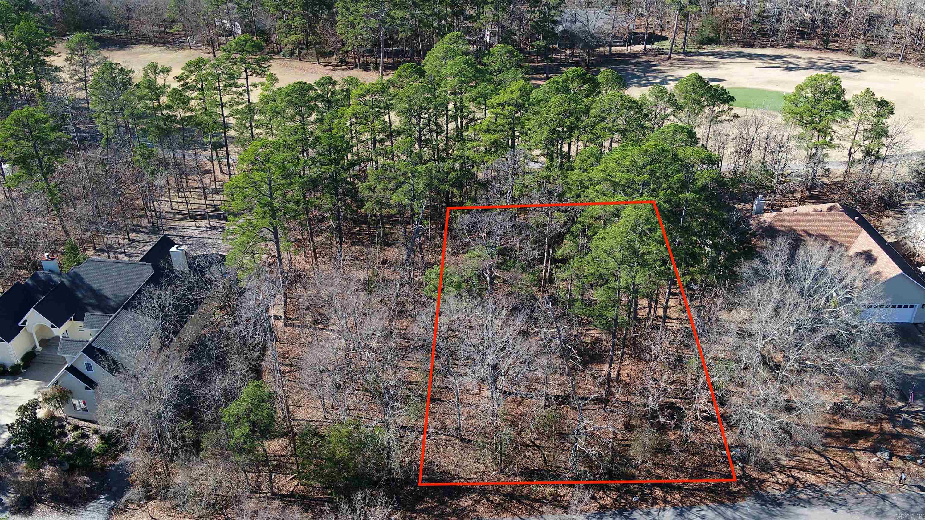 Build your Forever Home in the largest gated community in the United States with this select Saline County parcel.  Perfectly positioned for a custom build, this prime Saline County lot is nestled in the hills of Hot Springs Village. Overlooking the lush fairways of Coronado Golf Course, ownership of this parcel grants you access to a world-class lifestyle, featuring 11 stocked lakes, 9 championship golf courses, and a variety of amenities. Hot Springs Village maintains a fitness center, an indoor heated pool, racquetball courts, and more.   This particular parcel is about a 40-minute drive to downtown Hot Springs, and a 1-hour drive to Little Rock.  Whether you desire a secluded golfer’s paradise or a peaceful base from which to explore the nearby cities, this Hot Springs Village site offers exceptional living at an unbeatable price. There is a one-time buy-in fee of $300.00 on unimproved lots for new members to HSV collected at closing.