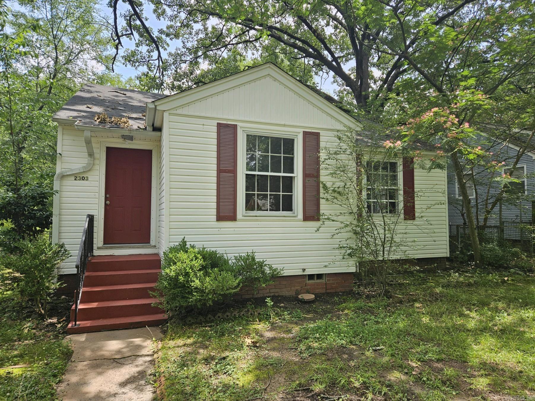 Walk / Bike to UALR !! Brand new electrical panel and AC compressor. Updates made! Full bath fixtures. Re-painted walls and ceilings. Original hardwood floors made to shine. Built in desk with a window view makes this a work from home haven. Kitchen has original steel cabinets. Brand new gas stove. Beautiful natural lighting. Original ceramic tile details in bathroom.