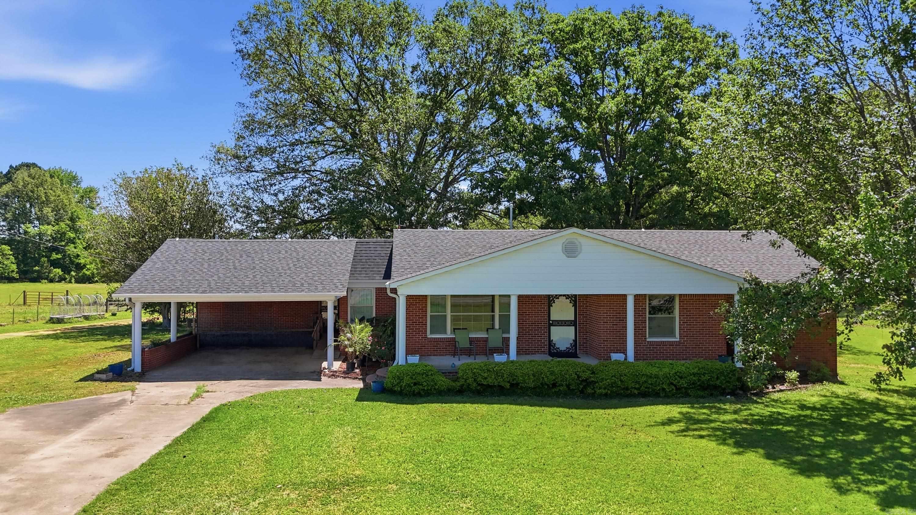 Discover this solid built home, move in ready with vintage charm in a peaceful country setting on 5.3 acres. It features 2 living areas, beautiful wood built ins, an unfinished basement, new roof, hot water heater & dishwasher, and a newer HVAC. Yard is maintained by a robotic lawnmower system! Have or want livestock? You’ll be all set for horses or other livestock-the pasture is cross fenced offering 3 pastures each with their own water supply; a premium barn with electricity, water, concrete floors, 12’ doors on each end for easy drive thru and 6 stalls equipped with automatic feeders. Property also features a she-shed and RV hookups. Grab this one while you can! Agents see remarks
