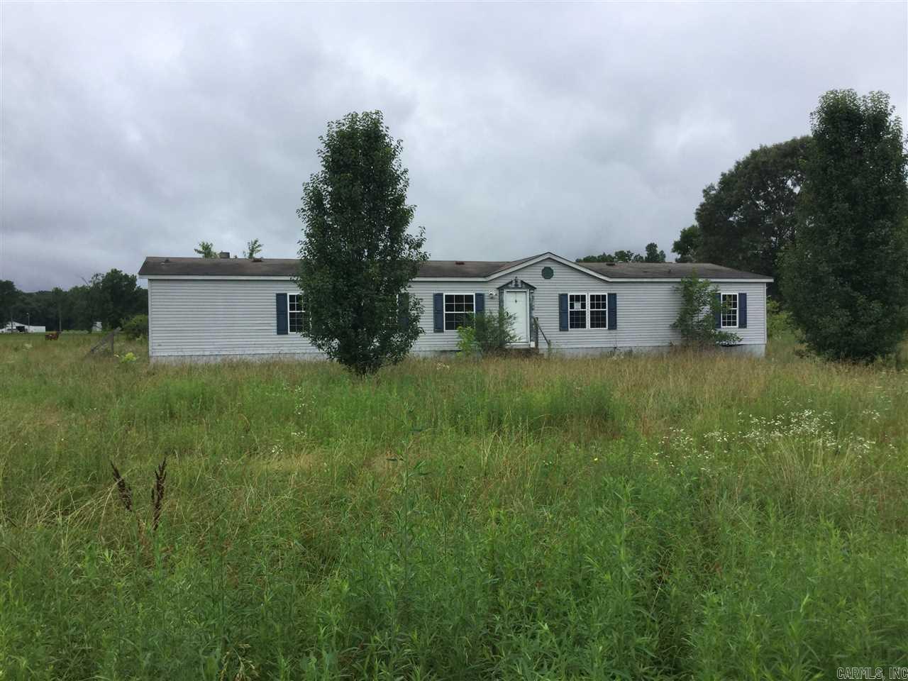 Large doublewide on 2 acres but has no water or electric to the property as well as no driveway.  Home sold as is. See attachment for PAS requirements and WFHM offer in submittal information in MLS document section. Please submit all offers to the listing broker/agent. To report any concerns with a listing broker/agent, or to report any property condition or other concern needing escalation (including concerns related to a previously submitted offer), please call: 1-877-617-5274