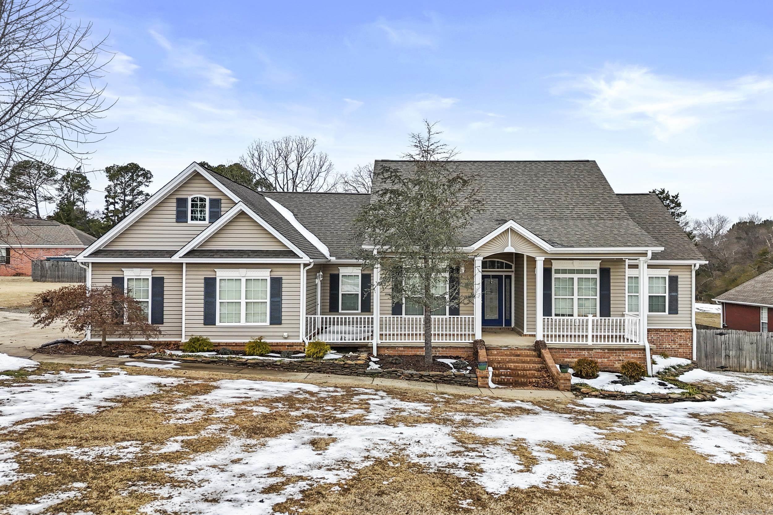 Beautiful home on a large lot on the west side of Searcy featuring a gorgeous updated kitchen with wood ceilings, a custom pantry AND a walk-in pantry, double oven, large breakfast bar, & new quartz countertops that is open to the living room. This lovely home has all new luxury vinyl flooring, formal dining room, 4 FULL bathrooms, a separate office with French doors opening to the foyer that can be a 5th bedroom. The bonus room /bedroom has a sitting area, workspace for office or crafts, a large closet and a full bathroom! The primary suite features tray ceilings, two large walk-in closets and access to the back deck! Two guest rooms are located downstairs: one is en suite with a huge walk-in closet & there is a guest bath located in the hallway for the other room...both of which have been updated. The large backyard is fully fenced & has plenty of room for your furry family members to play along with a storage building, plus a 3-car garage! Call today to schedule your tour of this wonderful home!
