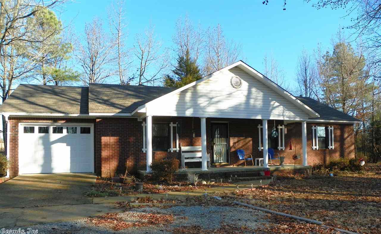 3BR 2.5BA brick home on 1.99 acres in prime location between Jonesboro and Paragould. Large living area. Kitchen/dining combo w/breakfast bar. 10x20 sunroom that is heated & cooled and includes gas wall heater for backup. Spacious master bedroom. 300 sq ft shop & 16x20 Morgan storage building.  New roof in 2009, extra insulation added 2010.  Priced to sell!! Call for your tour today. SEE AGENT REMARKS