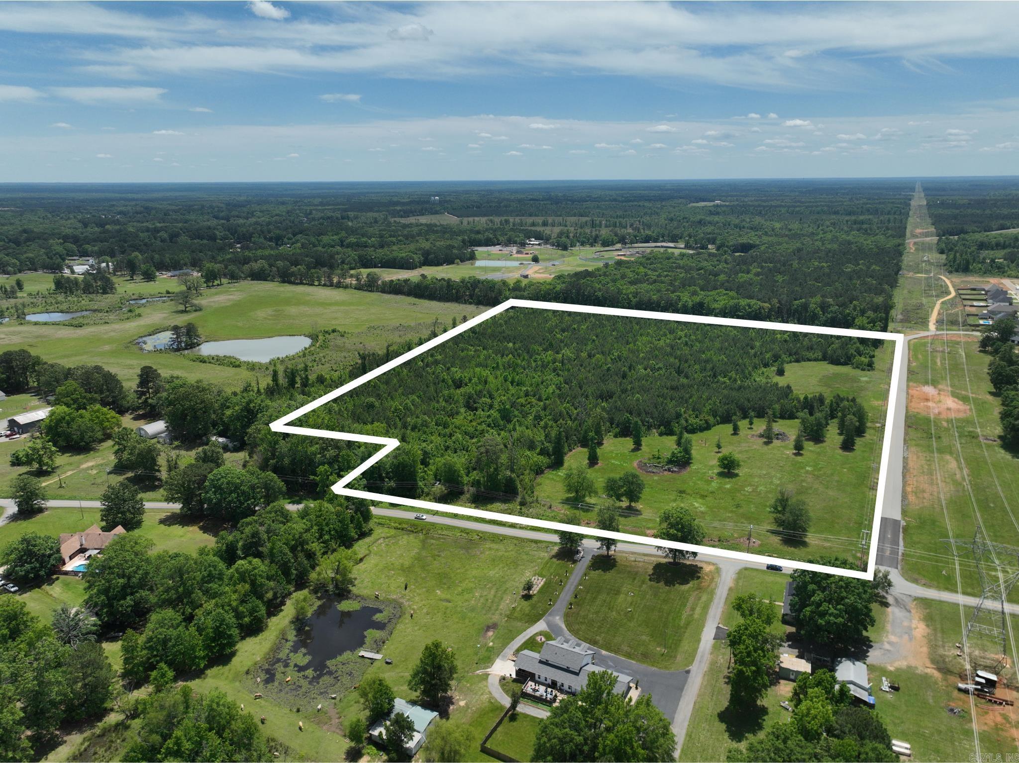40± acres available for sale in Sheridan, Arkansas, featuring approximately 26± buildable acres ideal for residential development, estate lots, or a private community setting. Utilities are available on site, helping support future development plans. A natural creek runs through the property, creating an attractive feature that could be incorporated into community walking trails, green space, or other outdoor amenities. Conveniently located near Interstate 530 and the City of Sheridan, the property offers a strong combination of accessibility, natural surroundings, and development potential.