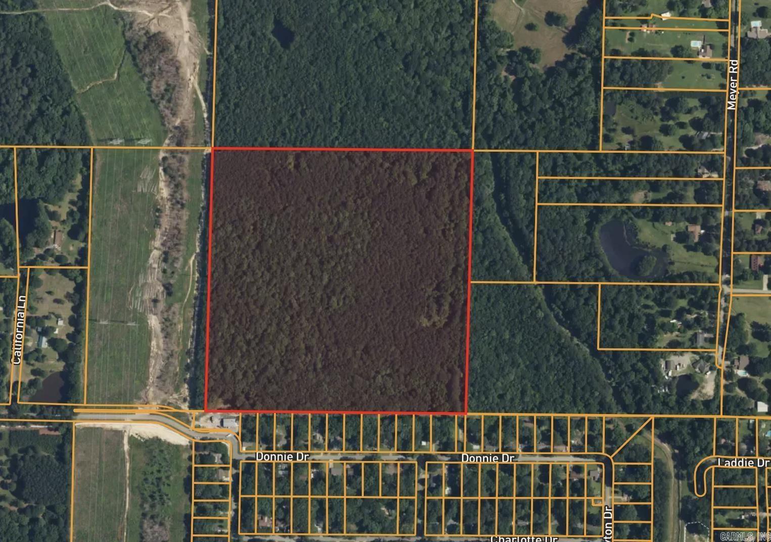 Prime 35 Acres on the Pulaski County Side of the Saline/Pulaski Line   A rare opportunity to secure 35 acres of strategically located land positioned between Shannon Hills and Little Rock. This expansive tract offers exceptional potential for residential development, long-term investment, or a private estate, with R-2 zoning already in place. The location provides the perfect blend of privacy, accessibility, and growth-area momentum.  Utilities are nearby, and the surrounding corridor continues to see steady residential expansion—making this an ideal site for builders or investors looking for their next project.  Call for more information or to walk the property