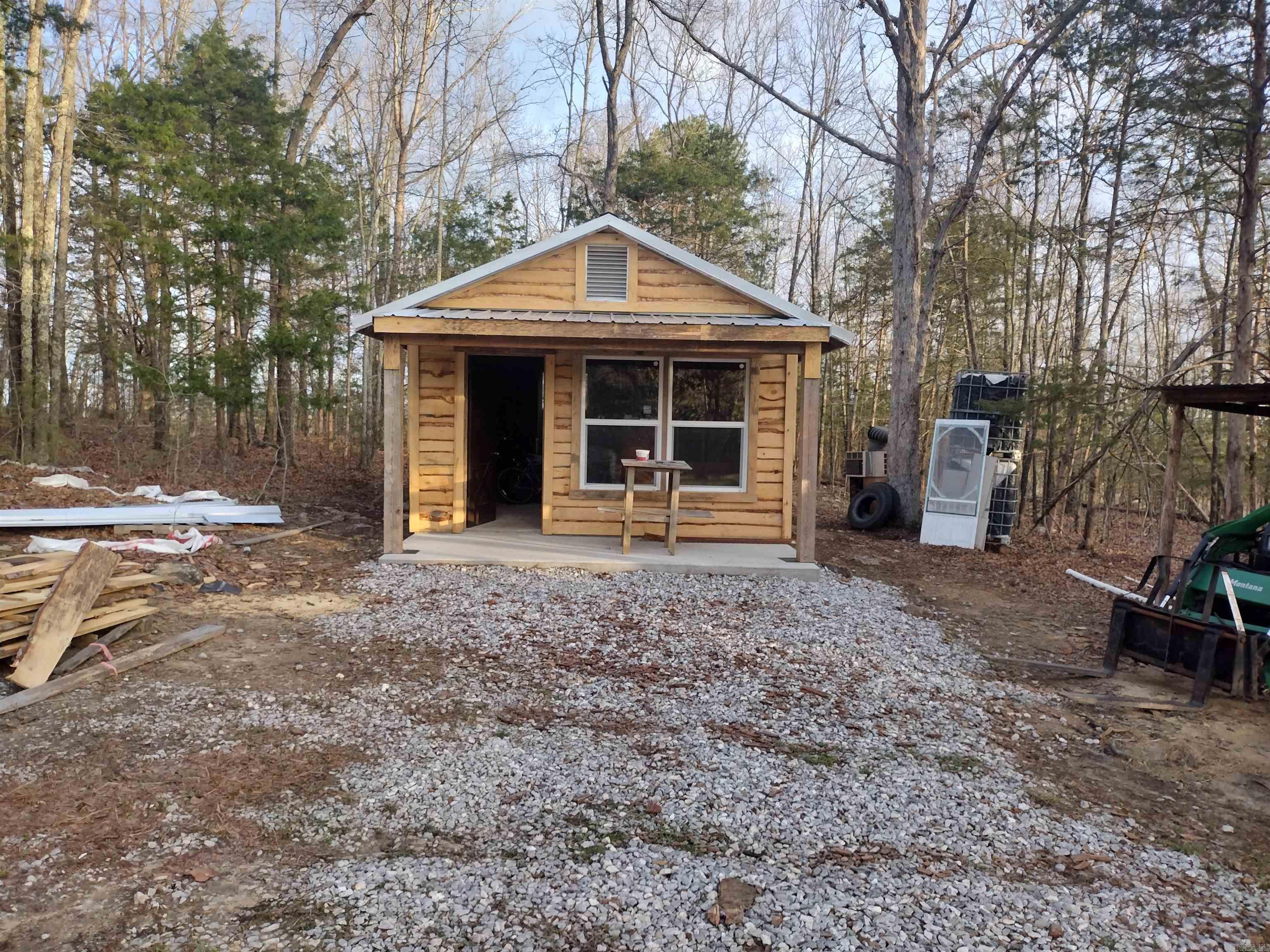 Looking for the perfect place to build your dream home? This gorgeous property offers stunning views a wet weather creek - peaceful privacy while still close to everything, House site has already been cleared to capture those amazing views small shed that could be converted into living quarters, for guest or temporary home. close to Ozark Folk Center and city ball field, whether your ready build now or planning for the future this property is a great opportunity to enjoy country living with convenience .