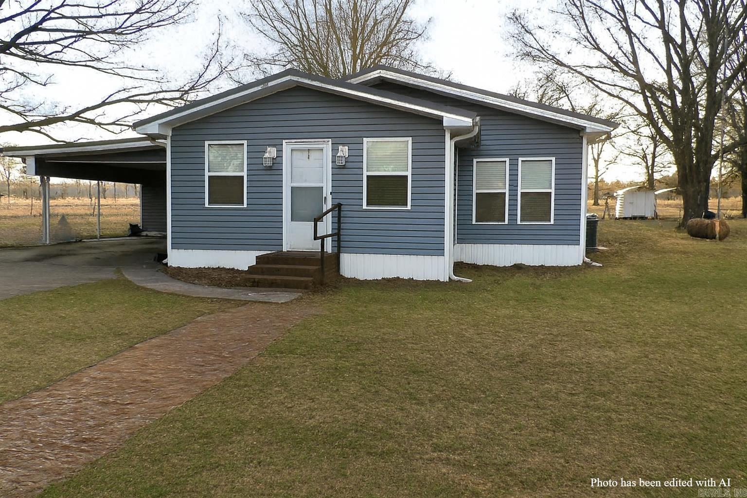 This home sits peacefully in the country on a quiet county road, offering the privacy and space that rural buyers love. Situated on 2.50 acres, the property provides plenty of room for gardening, outdoor activities, or future improvements. The home has been partially remodeled, giving you a comfortable blend of updated features and the opportunity to add your own finishing touches. Whether you're looking for a quiet retreat, a small hobby property, or a place with room to grow, this setting delivers a calm, country lifestyle with easy access to town conveniences.