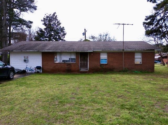 New to the market is 1107 Estelle St in Lake City, AR! This home is a spacious 4 bedroom, 1 bathroom that you won't want to miss. Upon entering the home, you are welcomed with a cozy living room that opens up into a spacious kitchen and dining area. If you go right down the hallway you will find 3 bedrooms, and 1 bathroom. Continue back through the kitchen to the left and you will find a laundry room, and a large master bedroom that offers plenty of privacy and even has it's own entrance! Outside you will find a large fenced in backyard and storage shed. Both the hot water heater and roof are less than 5 years old! This house is awaiting your own personal touches to make it your home! Call today because this 4  bedroom under 100k won't last long!
