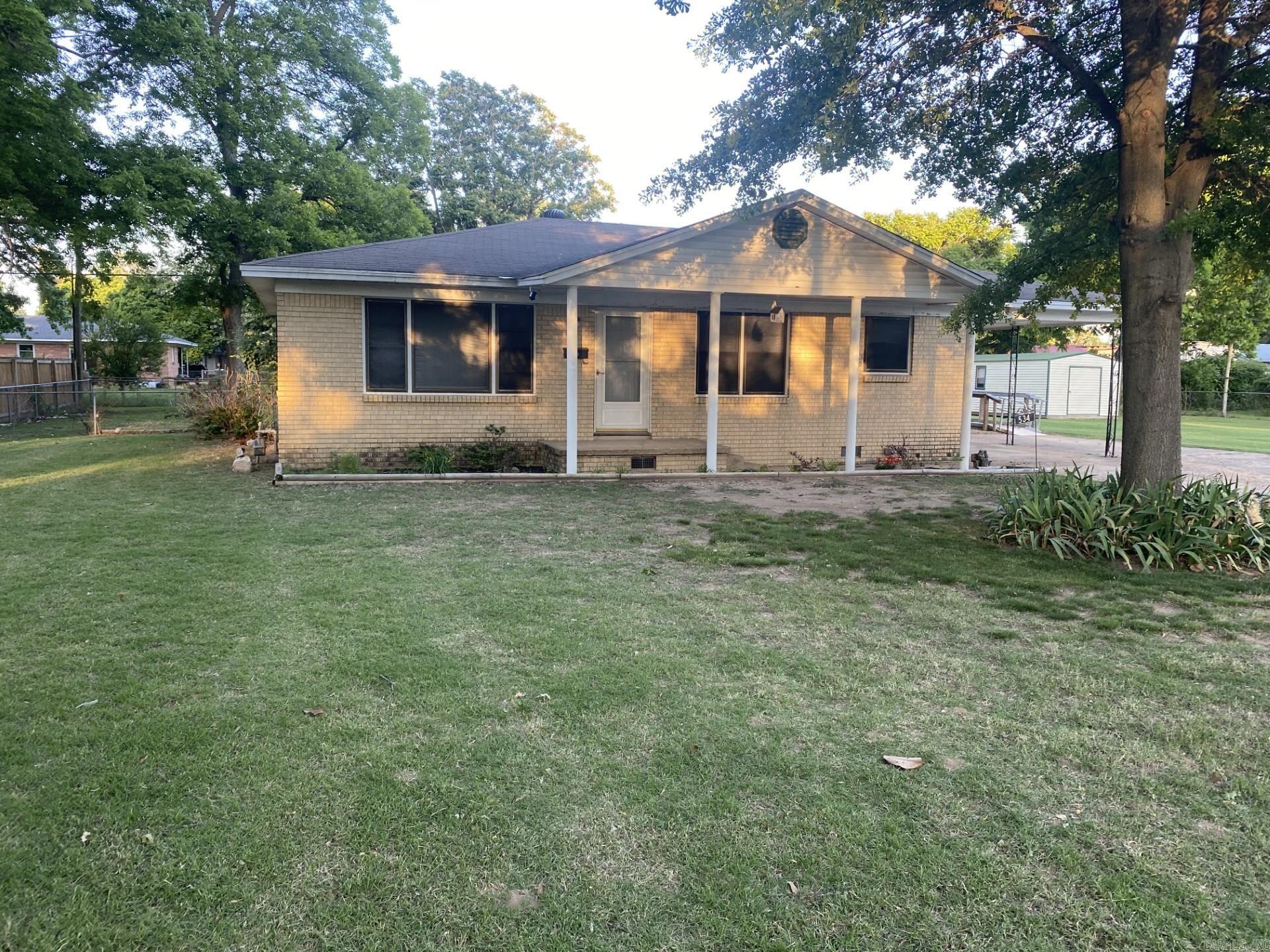 2 Bedroom, 2 Bath sitting on (2) lots with a carport, storage, and a shed. This house offers a very nice kitchen with a gas cooktop and a double oven. Legal Description: Lot 11 & 9 Block 1 excluding W8' of Lot 11 1:)Parcel #: 555-00591-0000 2:)Parcel #: 555-00588-0000