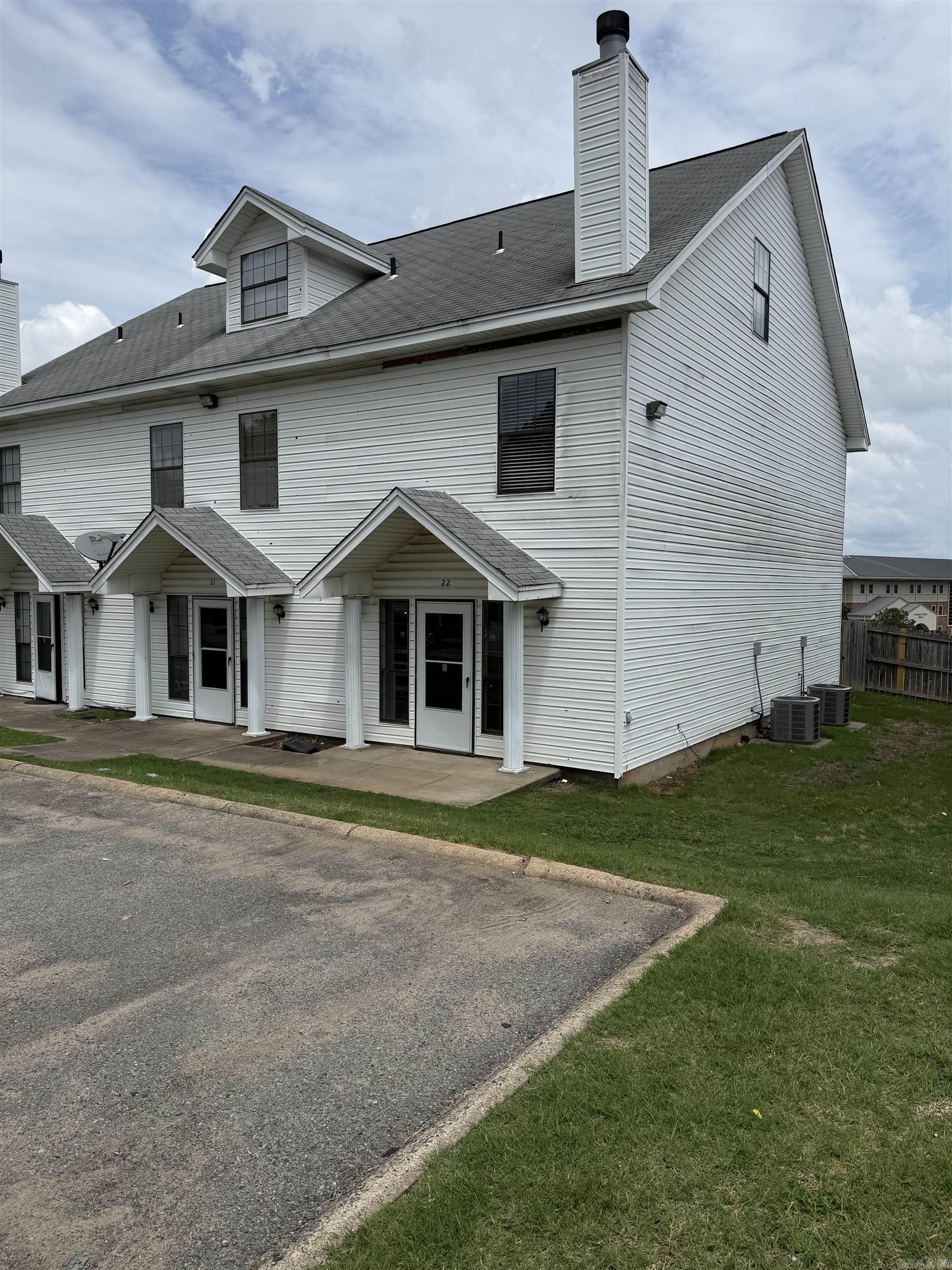 Nice, updated, and affordable tri-level condo in Edgehill Townhomes. Tons of updates inside, ready for owner occupant or investor! New flooring, new interior paint, private back patio. Living room and kitchen with half bath downstairs. Guest bedroom and bathroom, primary suite with it's own bathroom on 2nd level, and 3rd bedroom on top level. All electric (no gas), 2 ac units, fridge conveys, 1 assigned parking spot.  Seller paying $750 of buyer's first year home warranty. Priced to move, don't miss this one.