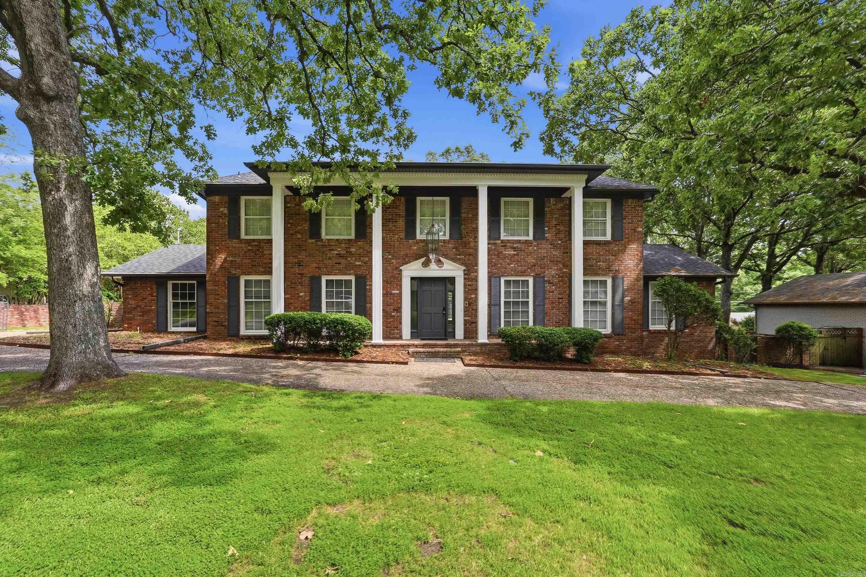 Luxury meets location in this FULLY REMODELED Lakewood stunner in the heart of North Little Rock. Offering 3,974 square feet, this impressive home features 4 bedrooms and 3.5 baths with high-end finishes throughout. Major upgrades include a brand-new roof, A newer hot  water heater, and a refinished in-ground pool, creating a true turnkey experience.  Designed for both entertaining and everyday living, the home boasts two expansive living areas, with one perfectly suited for a game room, media room, home gym, flex space or even turn it into a master suite. The layout flows effortlessly while still offering room to spread out.  The primary suite is a showstopper—a private retreat with spa-like appeal that must be seen to be appreciated. Step outside to your backyard oasis, where the sparkling pool sets the stage for unforgettable summer nights.  Located in the highly desirable Lakewood neighborhood, this home delivers space, style, and sophistication in one exceptional package.