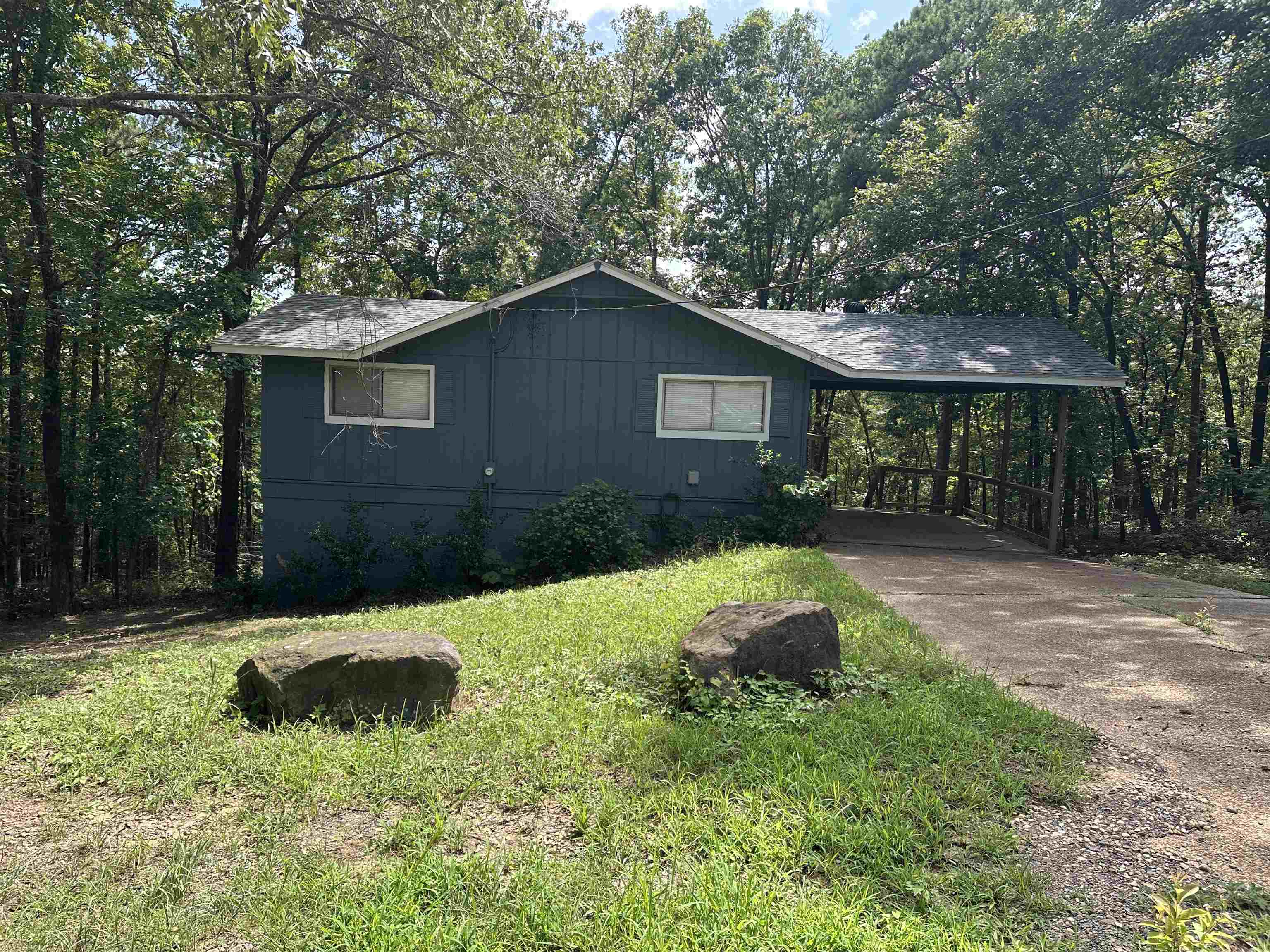Welcome to 175 Burnt Rock Falls Rd in scenic Fairfield Bay, Arkansas! This 3-bedroom, 2-bath home offers comfort, charm, and a peaceful setting surrounded by the natural beauty of the Ozarks. The spacious living room is perfect for relaxing or gathering with family and friends, Jo while the well-appointed kitchen offers plenty of cabinet space and functionality. The primary bedroom features a private bath and generous closet space. Step outside on the large deck just off of the living area and enjoy the quiet surroundings on a roomy lot with plenty of privacy. Located just minutes from all Fairfield Bay has to offer—golf courses, hiking and ATV trails, Greer's Ferry Lake, and resort-style amenities—this home is perfect for full-time living, a weekend escape, or an investment property. Don’t miss this opportunity to own your own piece of Arkansas paradise. Schedule a private showing today!