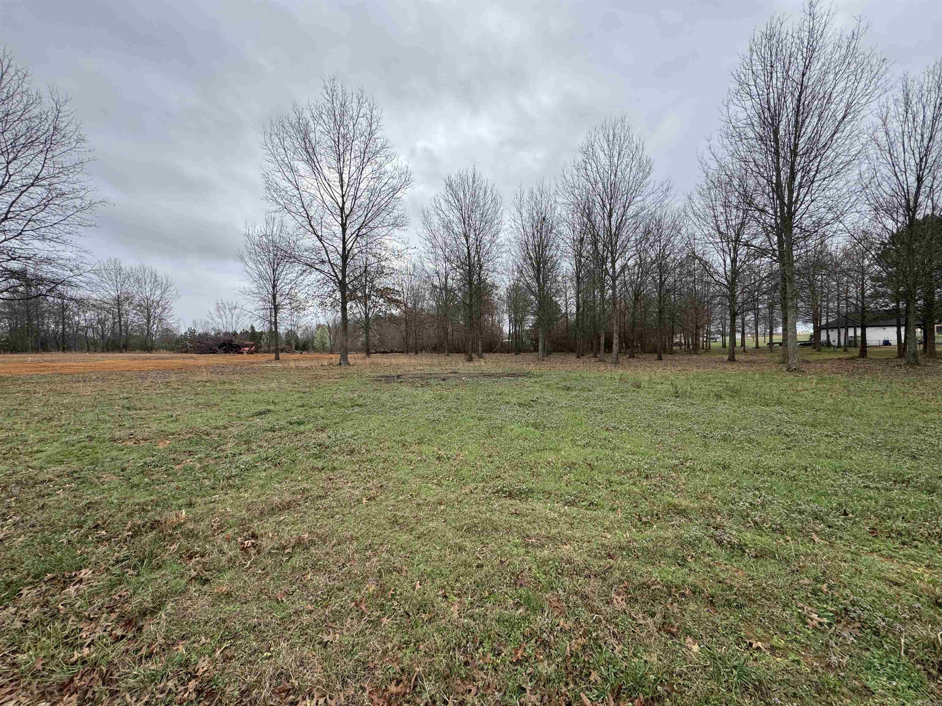Want to live on one of the best private lakes in Arkansas? Then this is the place for you! This lot is one of the largest available on the newly opened up, Phase 2 of Win Meadow Lake Subdivision. The lot boasts plenty of room to enjoy living with your view of the sun setting across the tranquil Win Meadow Lake. This 55 acre lake offers excellent fishing opportunities and is fully stocked with trophy Largemouth Bass & Crappie. Enjoyment of the lake is limited to residents of the subdivision and their guests. There is a well-maintained boat launch and fishing access available to residents of the lake. Homes built here are subject to a few covenants to maintain a beauty and quality of living found few other places. Come check out this beautiful neighborhood today! Only a limited number of lots are left available to the public so don't expect these to last long.