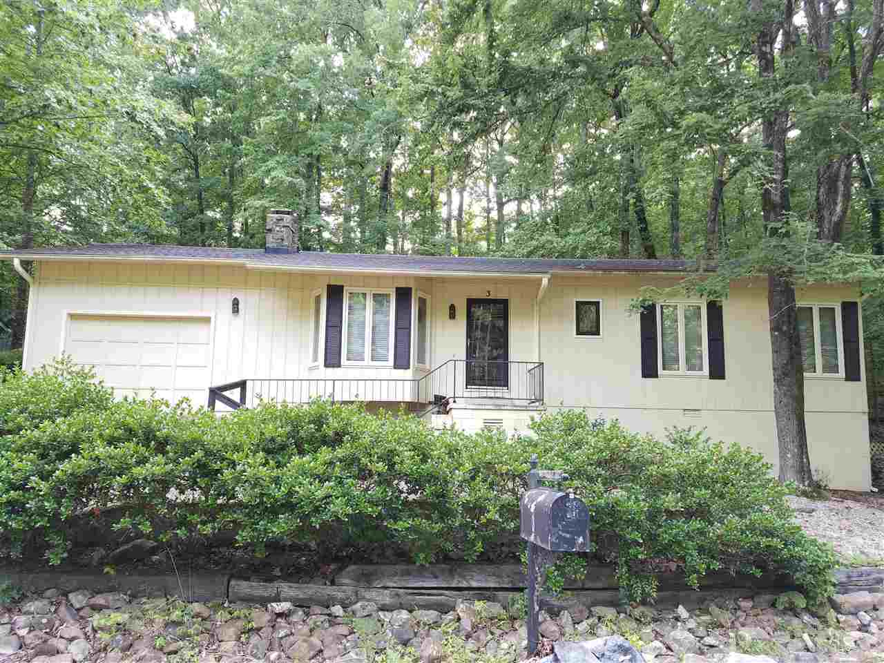Move in ready home with large Arkansas Sunroom.  Beautiful wood burning fireplace with easy cleanout in large one car garage.  Hardwood Floors two bedrooms and 2 full baths.  Master has double closets.  New roof 2016, new heat exchange 2017, French drains around home  2015, new garbage disposal 2015.  All appliances convey.  Must see to believe.