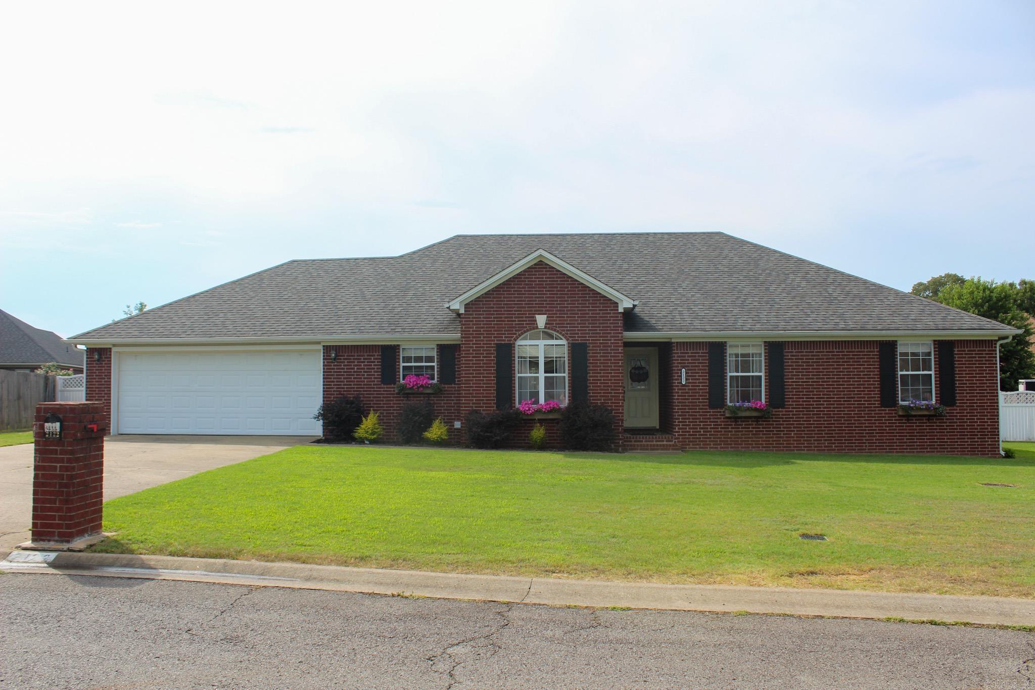 Welcome to this delightful and well-maintained home situated in a highly desirable neighborhood in Searcy. This charming residence offers an inviting atmosphere and is ready for you to move in. The home features a roof and HVAC system that is only 5 years old and a 6 year old hot water heater. The garage includes a storage and workshop setup that will convey with the property, providing ample space for all your tools and projects, while the backyard shed offers additional storage solutions. One of the standout features of this home is its abundance of natural light; large windows throughout the house allow sunlight to flood in, creating a warm and welcoming ambiance. The living room and master bedroom feature elegant tray ceilings, adding a touch of sophistication and style to the interior design. The backyard is expansive, offering plenty of room for outdoor activities, gardening, or simply relaxing under the open sky. This home has been lovingly cared for and is ready for its next owner. Whether you're a first-time homebuyer or looking to upgrade, this property has much to offer. Don't miss out on the opportunity to explore this lovely home today!