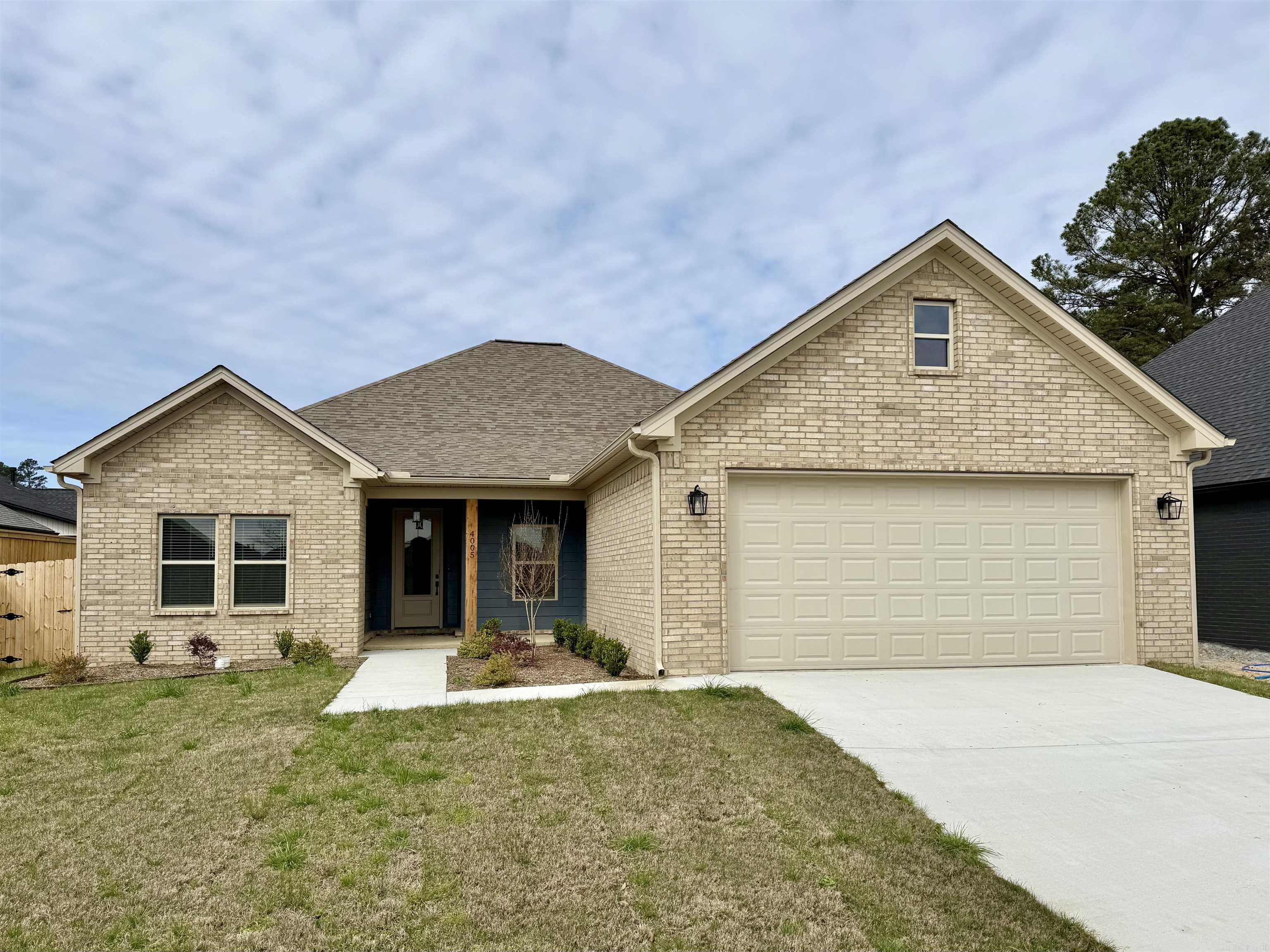 Beautiful 3 bedroom and 2 bath brick home in new sought after subdivision, Spencer's Crossing in Benton.  This would be a great home to entertain family and friends, or just look forward to relaxing at home with your family. New Construction with Split floor plan, perfect size living area, with beautiful vaulted ceilings, top of the line kitchen, large covered back patio, and beautiful fenced in back yard to name a few of the things that make this house special. Insulated garage and Gas tankless hot water tank are some incredible upgrades!