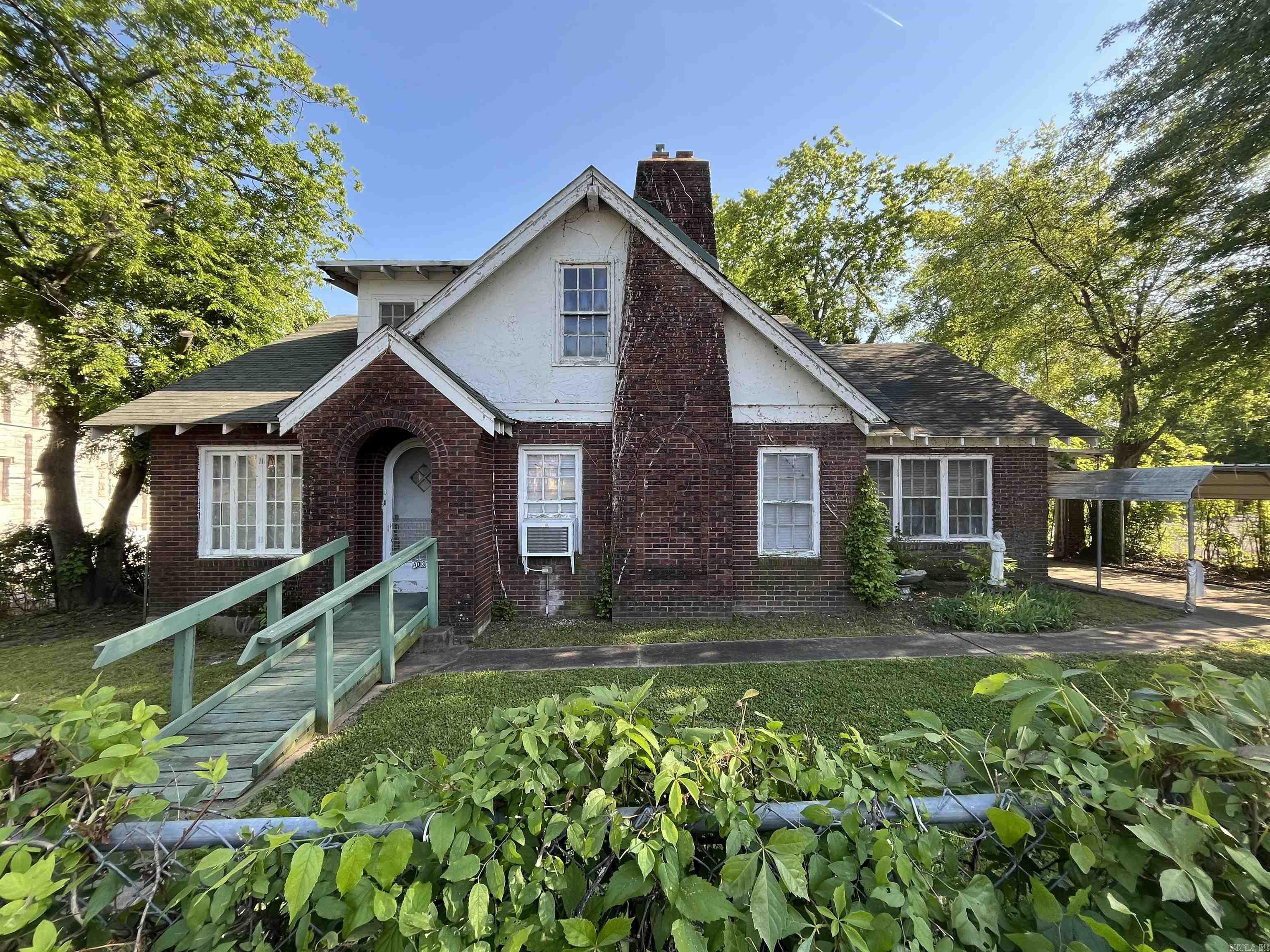 Investor special in the heart of downtown Hot Springs. This spacious two-story home features 5 bedrooms and 2 bathrooms with endless potential for the right buyer. Perfect opportunity for investors, flippers, or anyone looking to restore a property with character and space. Conveniently located near shopping, dining, entertainment, walking trails, and all that downtown has to offer. Bring your vision and make this property shine again!