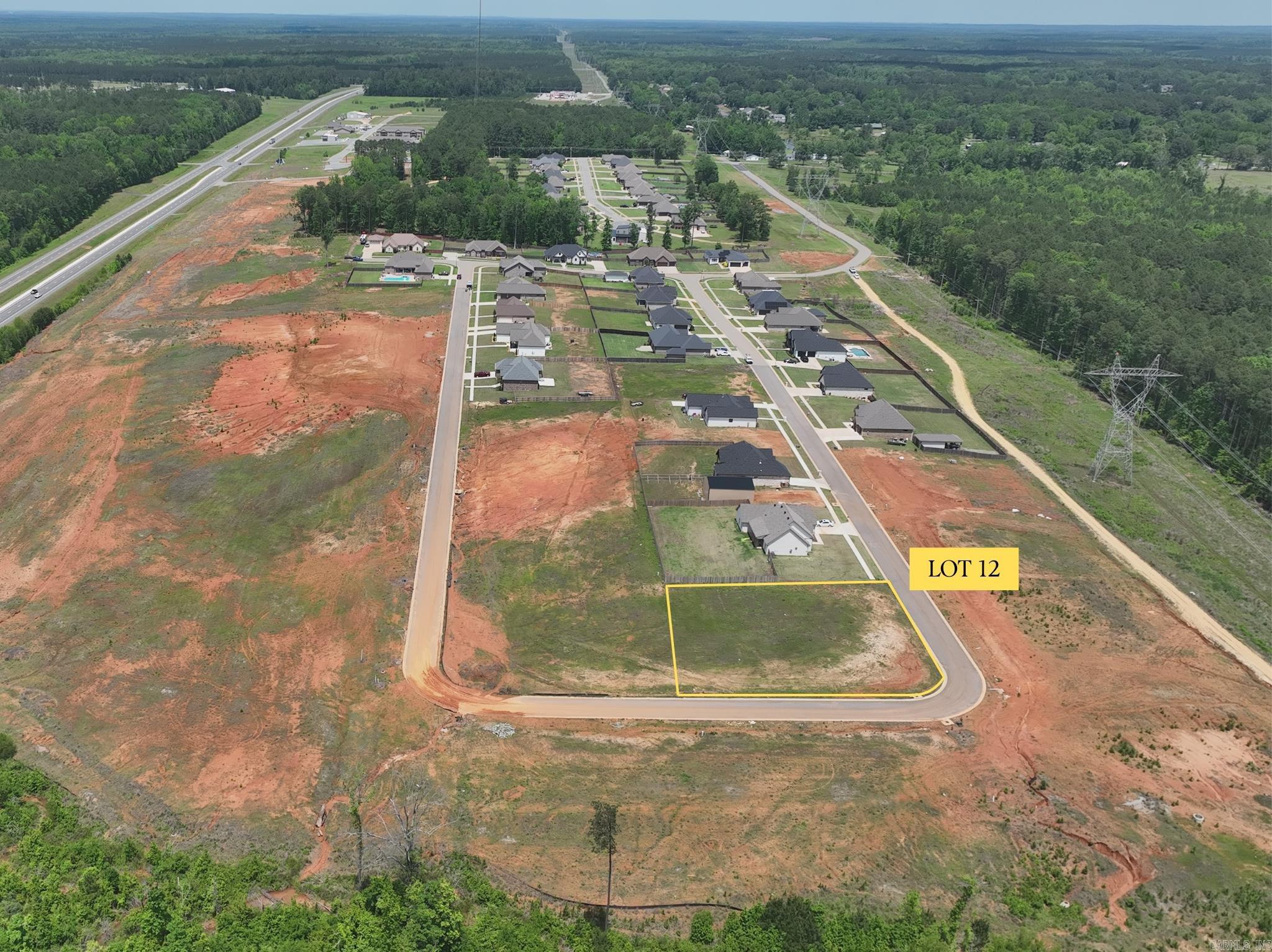 Build your future home in the peaceful Oak Tree South subdivision in Sheridan, Arkansas. Lot 12 offers a convenient location just minutes from Hwy 167, providing quick access to Sheridan, Little Rock, and surrounding areas while still enjoying a quiet residential setting. This homesite combines small-town comfort with easy access to shopping, dining, schools, and everyday amenities. Don’t miss this opportunity to own a residential lot in one of Sheridan’s growing areas.
