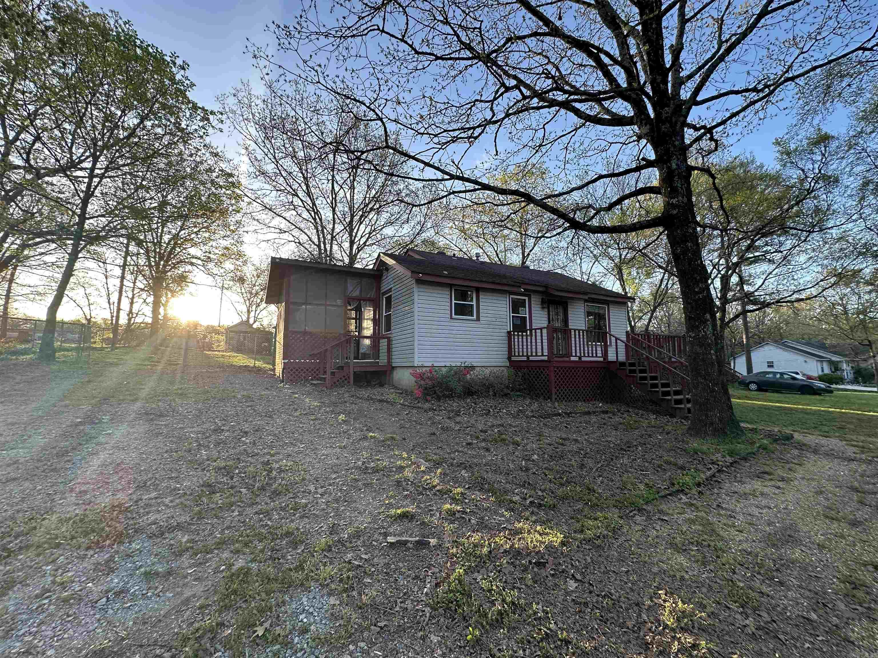 So many possibilities for this cute bungalow. 3 bedrooms 1 bath in the main house. A tiny house sits in the back that could bring additional rental income. Large lot. Come check this one out today. AGENTS SEE REMARKS.