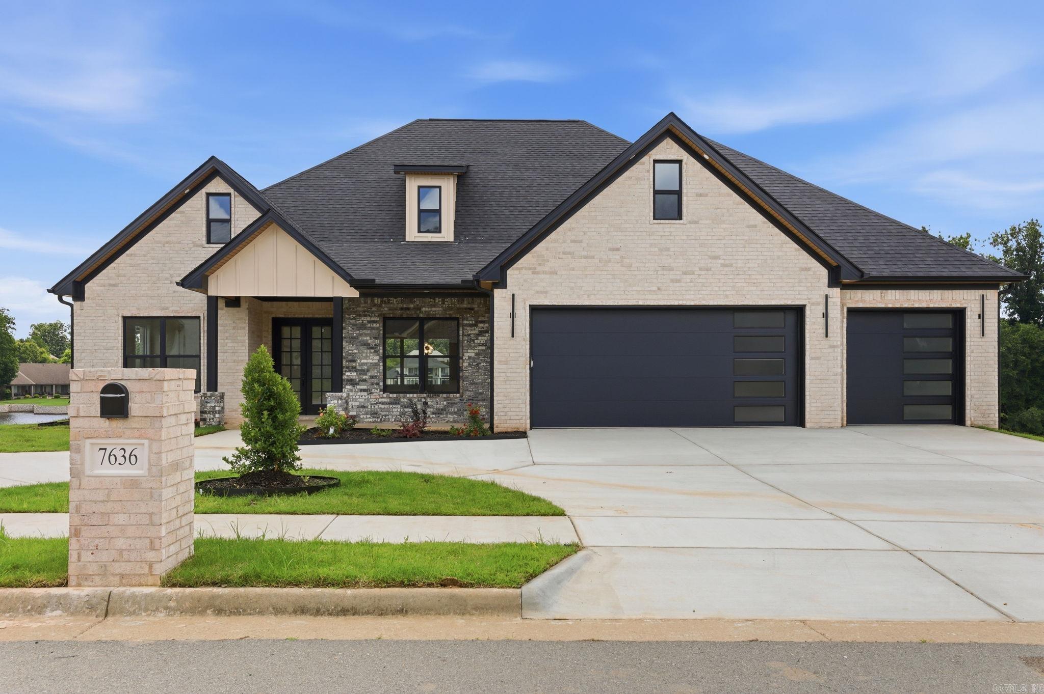 Say hello to 7636 Shoreline Blvd, Benton, AR—an exceptional 4,116 sq. ft. lakefront home located in the beautiful Hurricane Lake Estates. This stunning 2-story home offers 5 bedrooms and 3 bathrooms, providing plenty of space for family, guests, and entertaining. The main level features a beautiful open floor plan with an inviting living area, a spacious primary suite, and two additional bedrooms. Downstairs, you’ll find an incredible 29.6 x 22.2 living area complete with its own kitchen and pantry, creating the perfect space for entertaining, multi-generational living, game nights, or hosting guests. Step outside through the walk-out porch and enjoy your own backyard oasis overlooking the lake. Imagine relaxing with your morning coffee while taking in the peaceful waterfront views or spending evenings enjoying the beauty of lake life right from your very own private balcony. Direct lake access allows for boating, fishing, kayaking or just relaxing as the sun sets.  This home combines luxury, space, and breathtaking waterfront views in one incredible package.  This is one you do not want to miss. Call for your tour through this gorgeous property today!