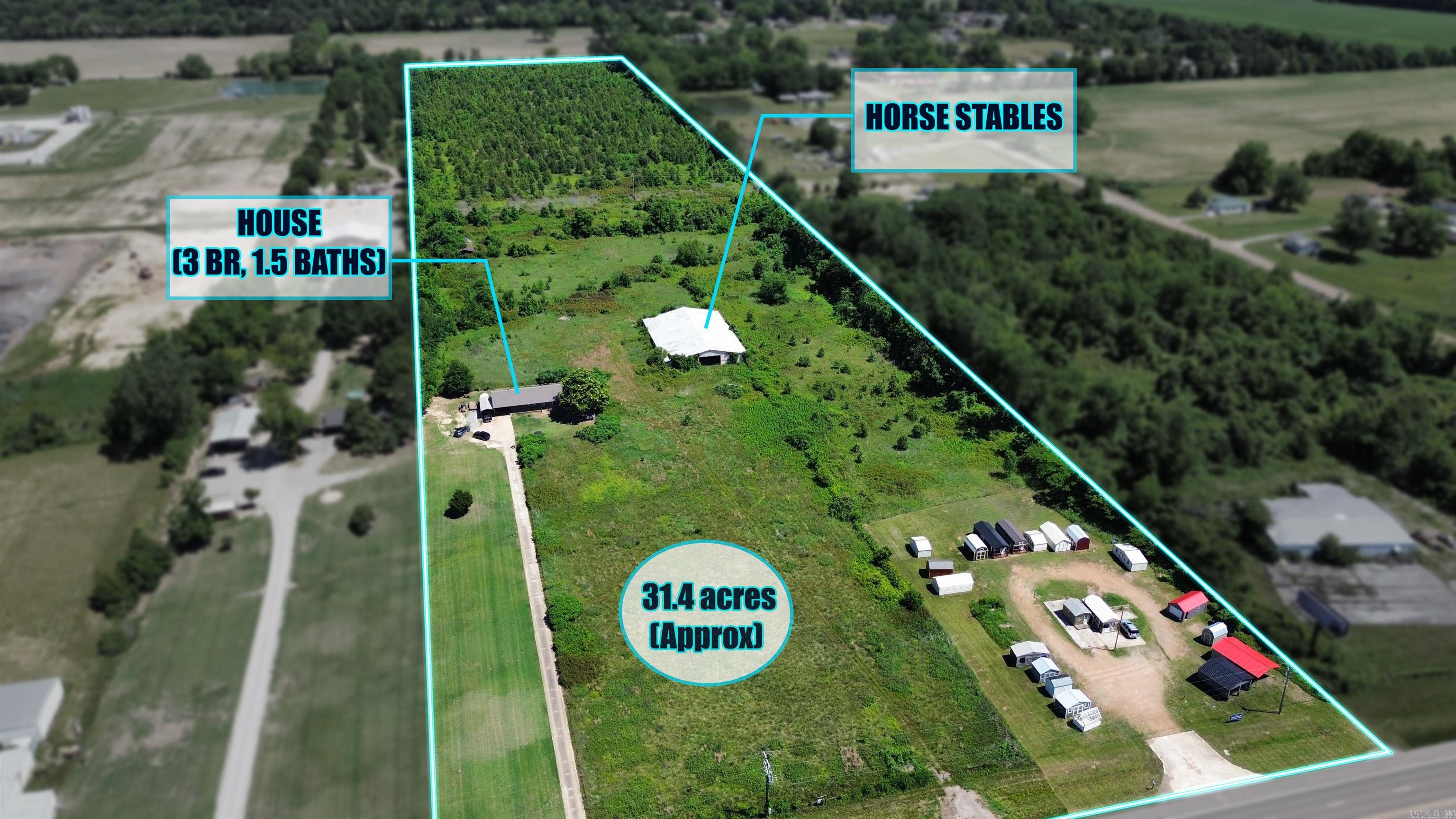This property located in Lexa offers potential for rural living, current income for the new owners, and recreational use. This 32.4-acre parcel is situated just off Highway 49, with approximately 500 feet of highway frontage. It consists of a residential ranch-style dwelling, a metal barn, and a partially fenced area. The brick home on the property includes 3 bedrooms and 1.5 baths and is located at the end of a paved driveway. The metal barn (approximately 80’x120’) contains multiple high-end livestock stalls for safety. Behind the home and barn is a mostly softwood area that could be utilized to construct new facilities or for extended farming and recreational activities. Call/text listing agent to schedule viewing today!