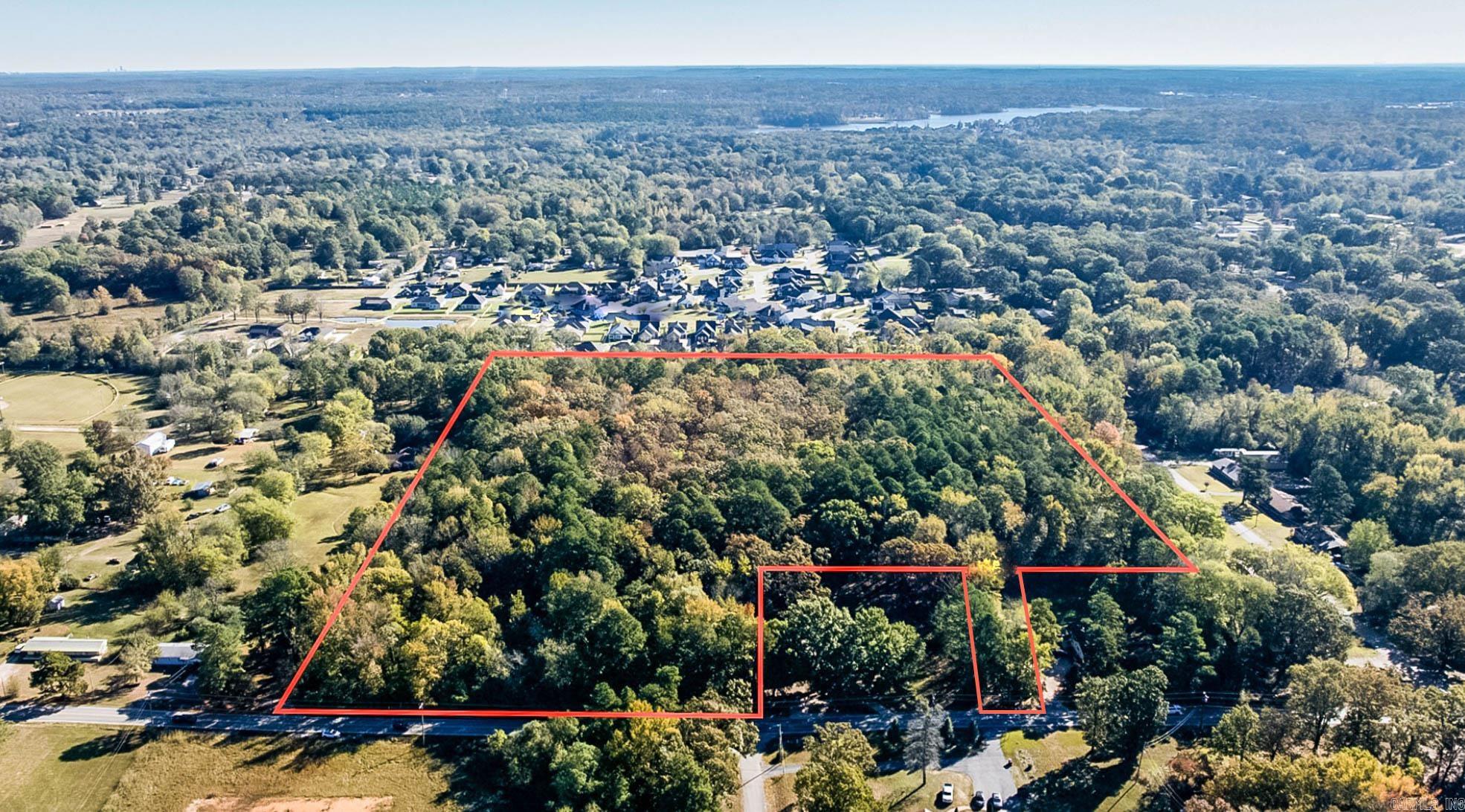 Calling all developers...This 20-acre tract of land is beautiful and would be a great place to build your home, several homes or even a subdivision.  There is room for 2 entrances which is very desirable.  Located in an aged mature wooded area right on Congo Road, convenient to local shopping and Little Rock as well.  Utilities at the street except sewer. This is a great opportunity in an area is rapidly growing!