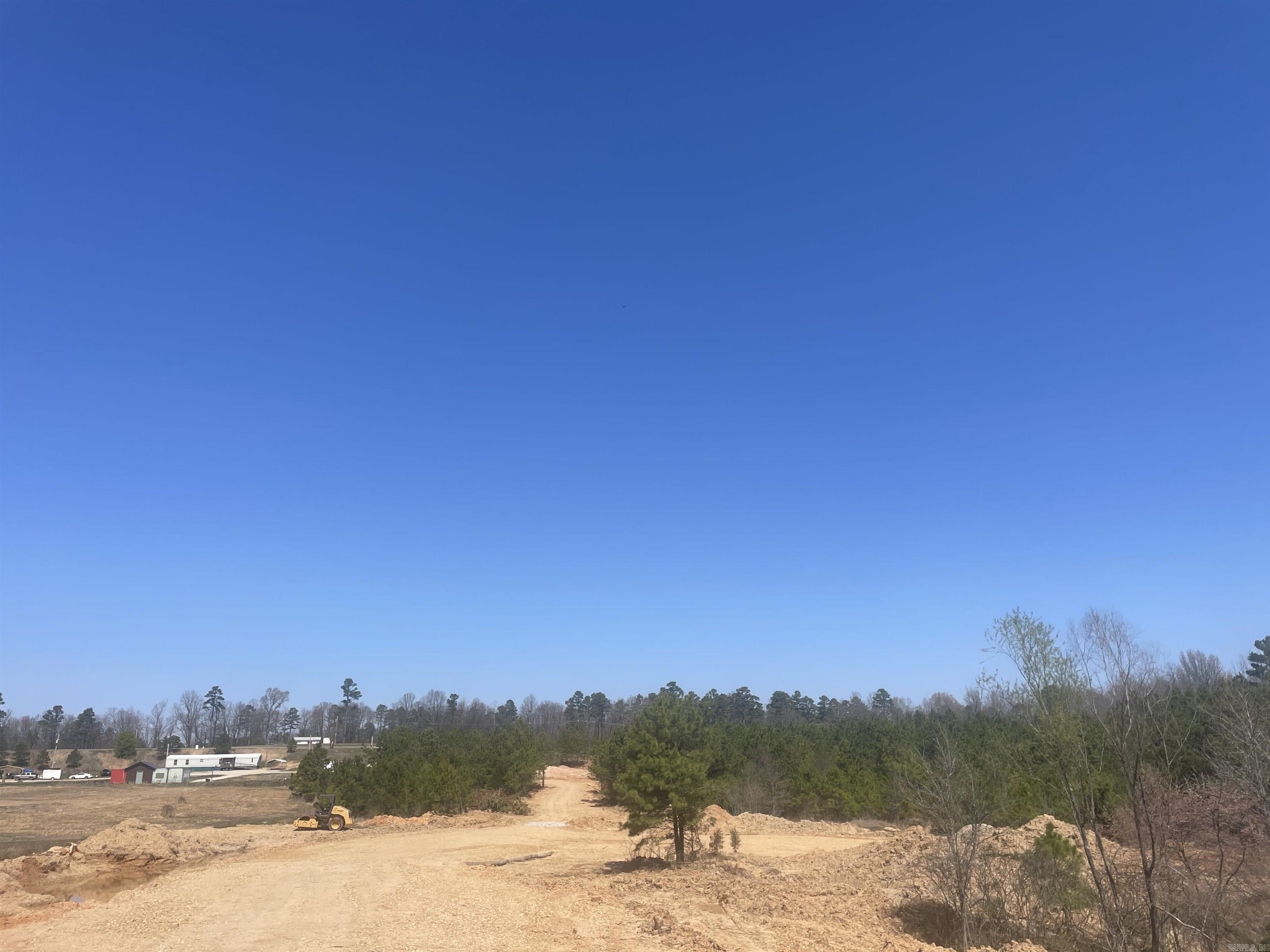 207 Acres +/- on Highway 412 West. Property also has frontage on GR 718 and GR 707.