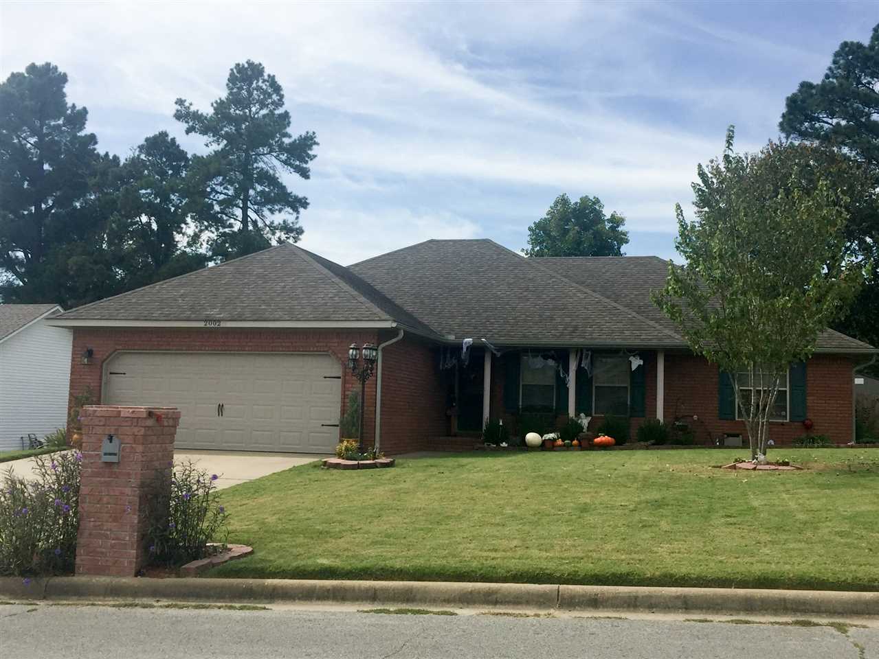 Beautiful "move in ready" traditional home with lots of updates!! This 3 bedroom/2 bath home is in peaceful subdivision! Interior features a living room with vaulted ceiling, kitchen/dining combination with new appliances including a gas oven and large laundry room, guest bedrooms with large closets and large master suite. Newly painted neutral colors throughout and new flooring makes home seem spacious and large. Exterior features a large new deck with awning, 10 x 16 storage shed,  new wood privacy fence