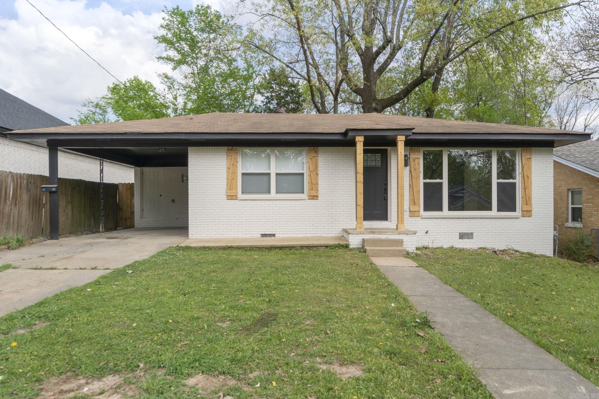 In the heart of Hot Springs! Welcome to this beautifully remodeled 3-bedroom, 2-bath home ideally located just minutes from shopping, dining, and Oaklawn. Featuring a fresh, modern look both inside and out, this property offers the perfect blend of style and convenience—whether you're searching for a place to call home or a great investment opportunity. Inside, you’ll find an open floor plan designed for comfortable living and easy entertaining, complete with an electric fireplace that adds a cozy touch to the living area. Recent updates throughout give the home a clean, move-in ready feel. Out back, a storage shed will convey as-is at no value, offering additional space for tools or hobbies. Please note, no seller property disclosure is available, and some photos have been virtually staged. Buyers are encouraged to verify lot size with their own measurements. Don’t miss your chance to own this updated home in a prime location!
