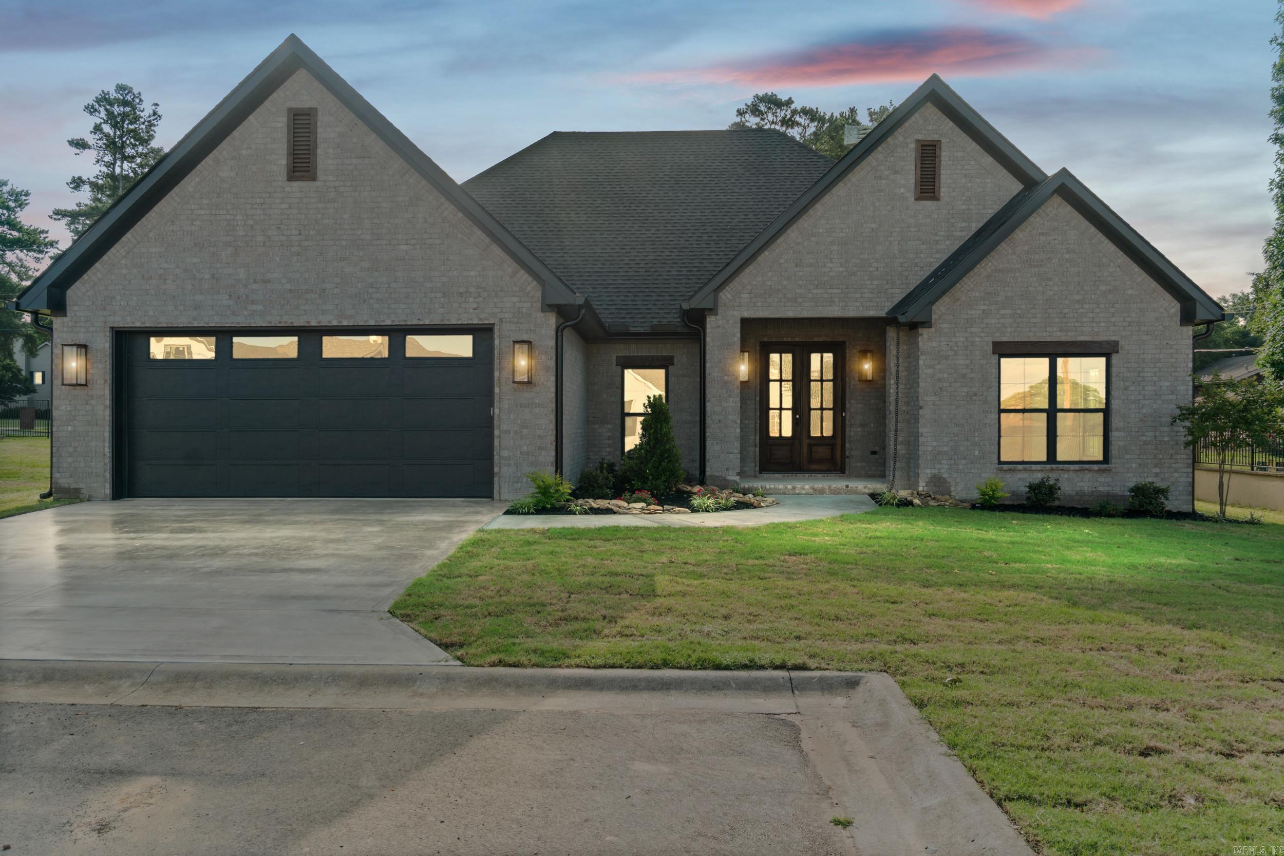 Welcome to this beautifully designed new construction in the Dominion. Featuring 3 bedrooms and 2.5 baths and offering thoughtfully designed living space combining comfort, style and functionality in one exceptional package.  Step into the inviting open floor plan with spacious living area, abundant natural light and elegant high end finishes throughout. The well appointed kitchen flows seamlessly into the main living and dining spaces, making it ideal for everyday living and entertaining.  The private primary suite flows into the en-suite and large master closet.  Enjoy ample storage and low maintenance living in one of Searcy's most desirable neighborhoods.