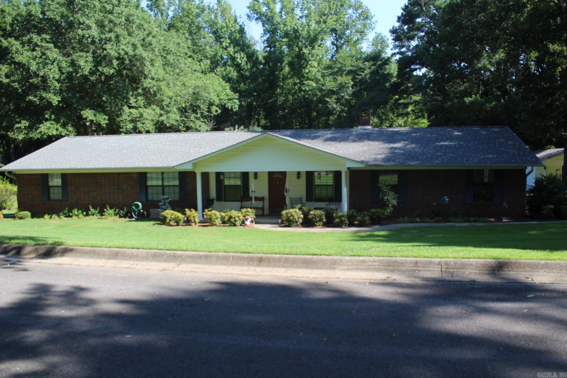 3 bedroom, 2 full baths with approx. 2048 Sq. Ft. of living space located in WILDWOOD subdivision.  Large kitchen / dining combo area (Range, microwave, refrigerator conveys with sell of Home).  Family area features wood burning fireplace.  2 car attached garage.  Home has a rear covered deck.  Property has a auto lawn watering system.