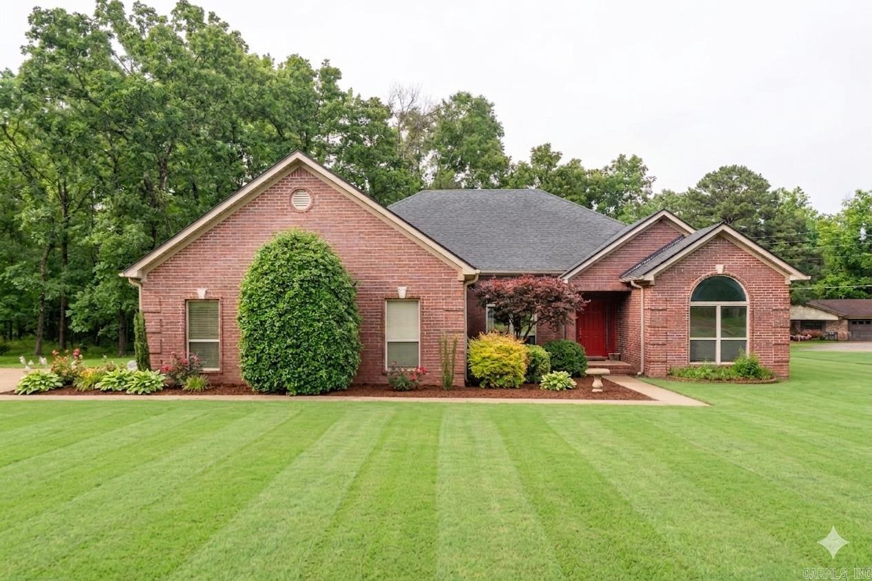 Welcome home to this spacious 4-bedroom, 2-bath property situated on over an acre of land, offering plenty of room to spread out and enjoy both indoor and outdoor living. Inside, you’ll find a cozy living room with a fireplace, an eat-in kitchen with a charming breakfast nook, and a separate dining area perfect for gatherings and entertaining. The bonus area provides additional flexible space that could be used as a playroom, office, or second living area. The spacious primary suite features a private en-suite bathroom and walk-in closet, creating the perfect retreat at the end of the day. With a functional layout and generous space throughout, this property has all the potential to be a wonderful family home. No seller property disclosure available. Some photos have been virtually staged. Buyers to verify lot size and house square footage using their own measurements.