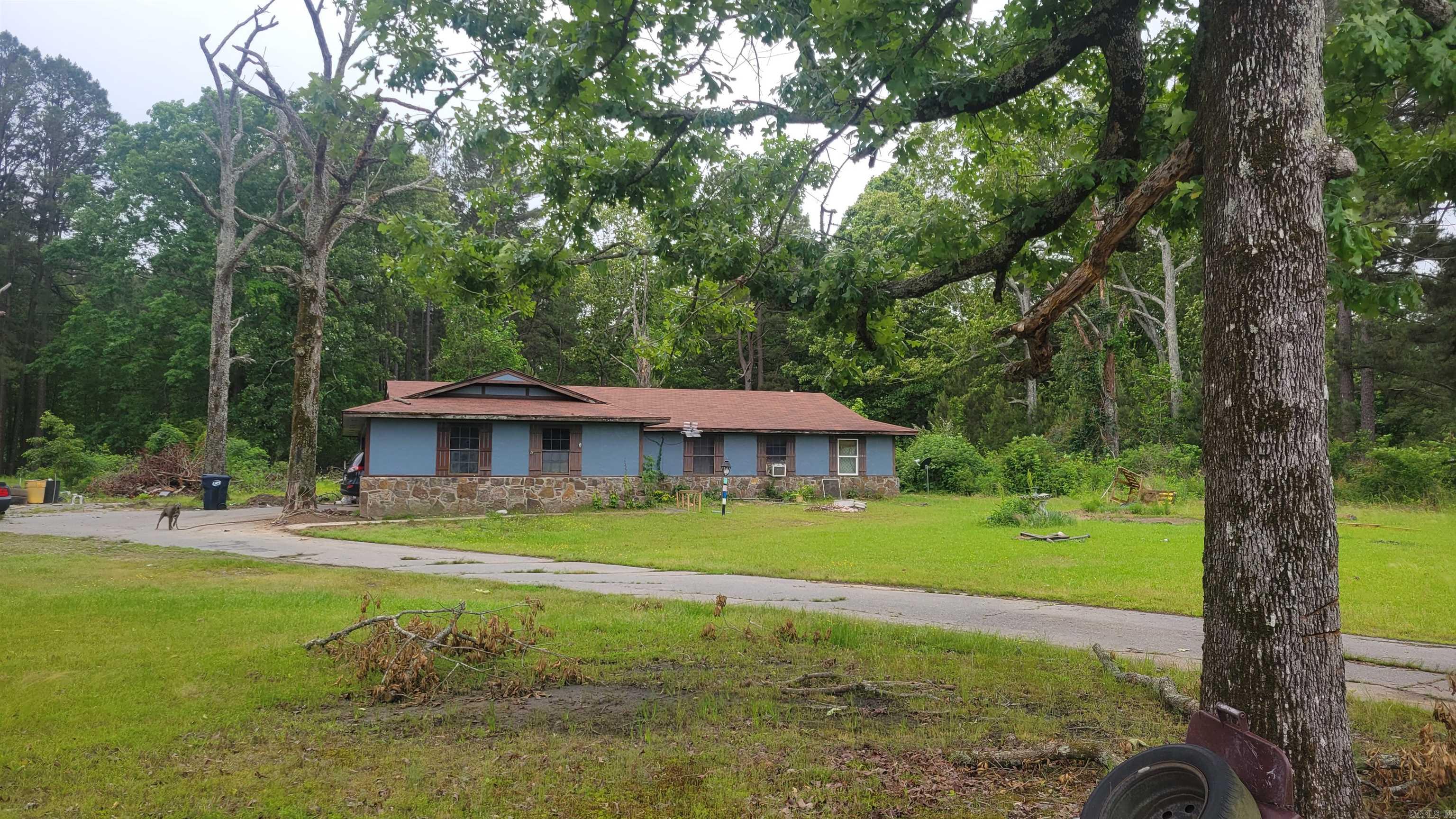 Situated on 3.32 peaceful acres, this property offers endless potential for those looking to create their dream homestead, hobby farm, or private retreat. The home is in need of updates and repairs, but with a little vision and TLC, it could truly shine. Surrounded by mature trees and open space, there’s plenty of room for gardening, recreation, animals, or future improvements. Whether you’re an investor, renovator, or buyer seeking country living with acreage, it is unrestricted and out of city limits. This is a rare opportunity to make it your own.